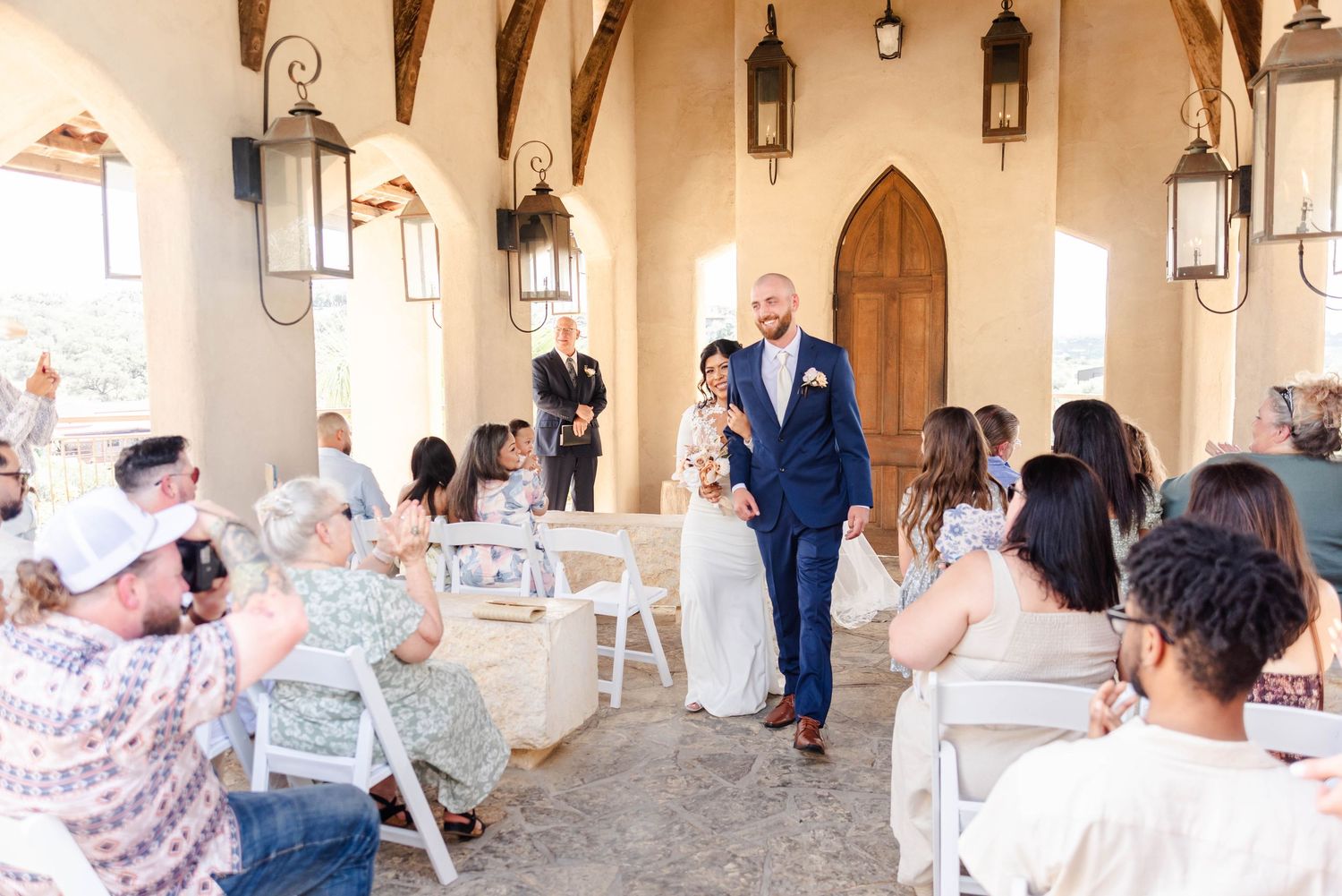 a couple walks down the aisle together