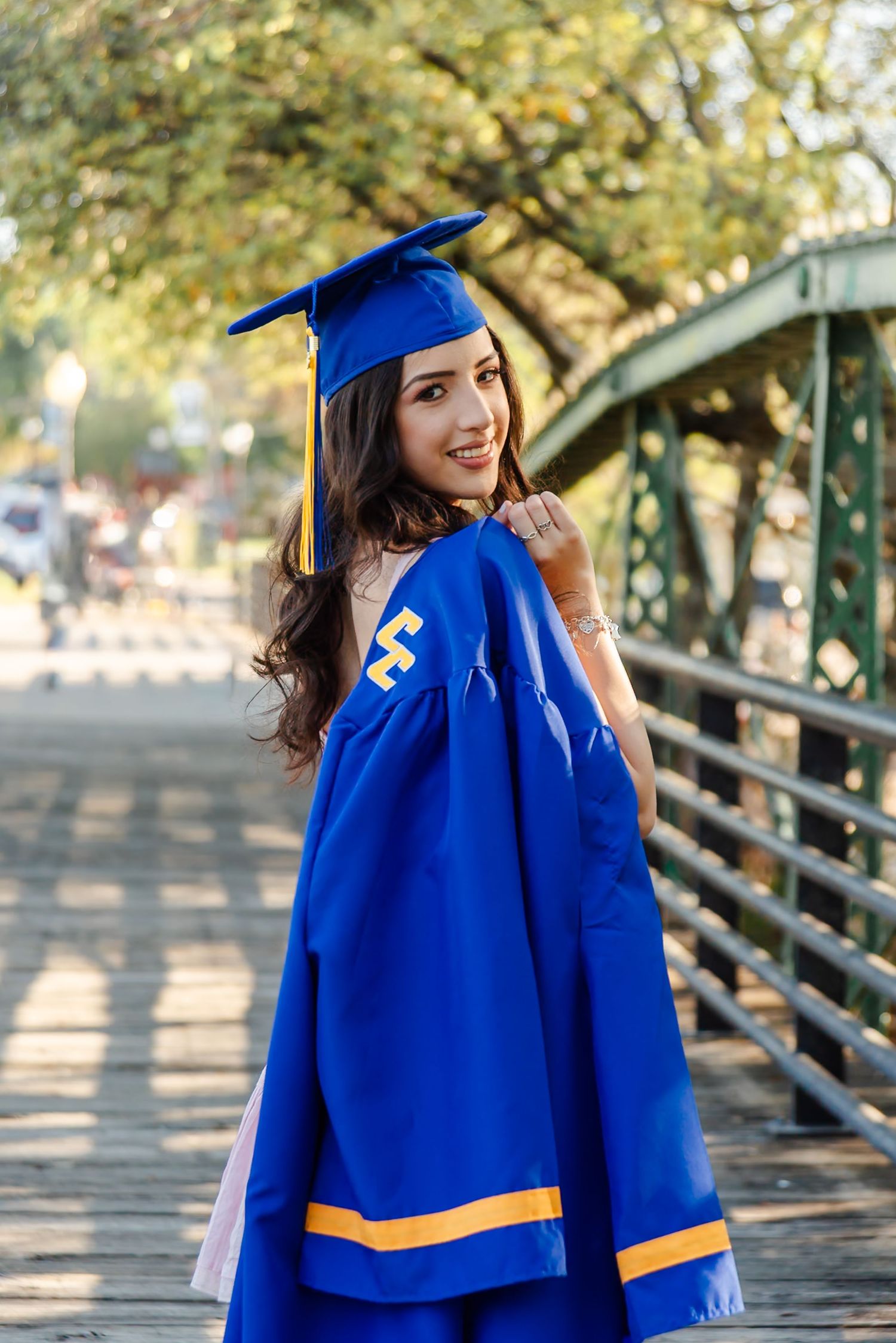 a senior in her cap and gown