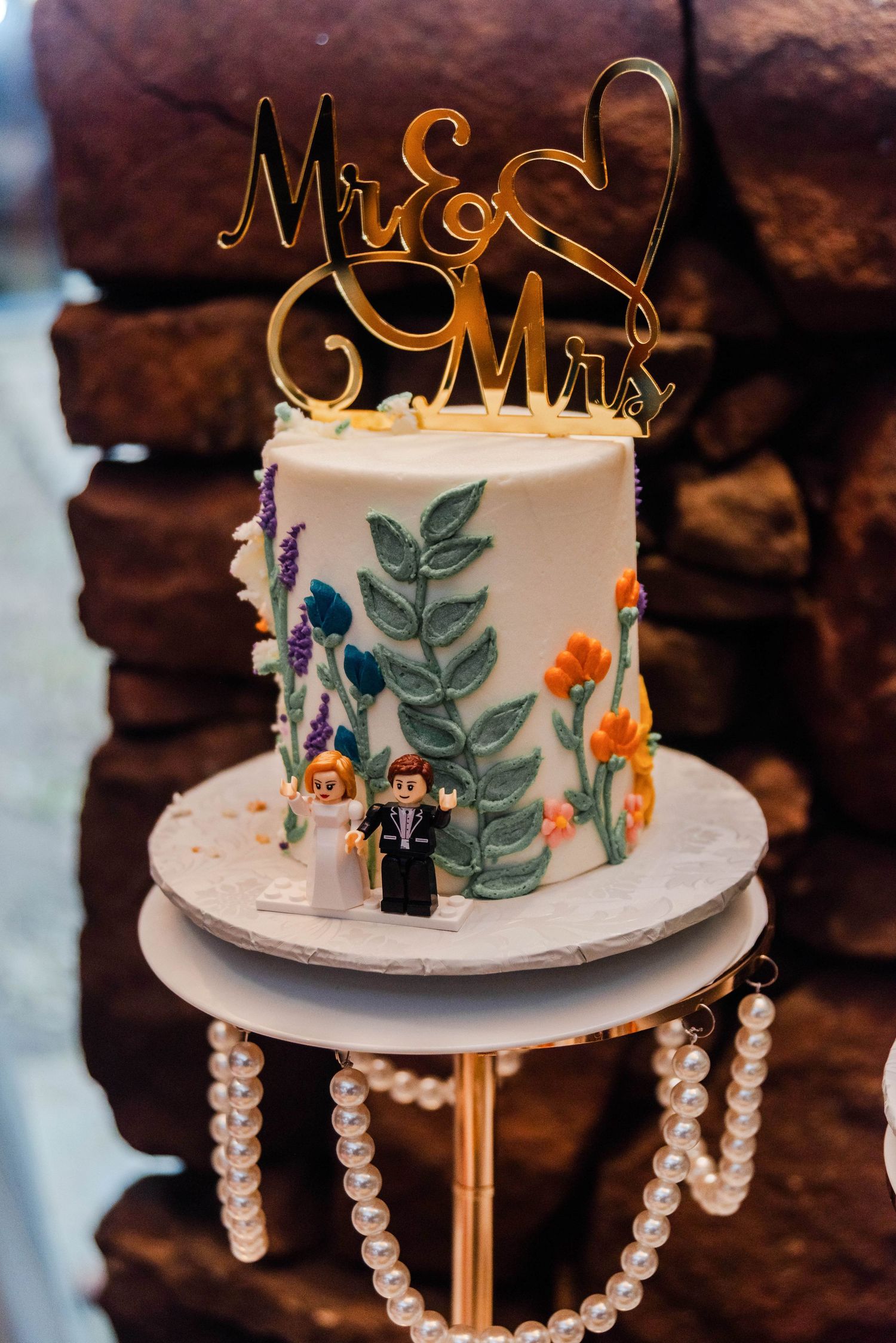 a wedding cake with florals