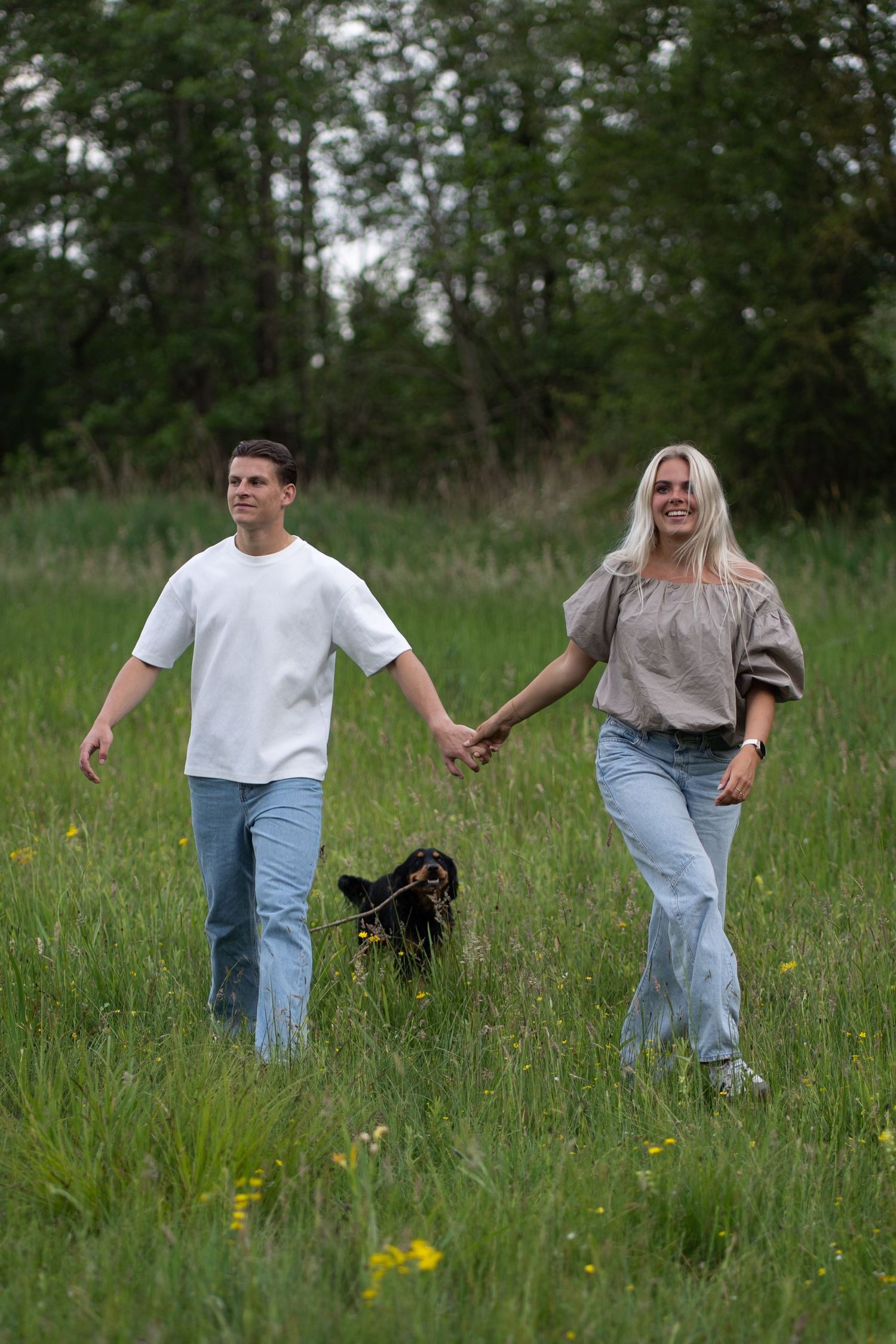 walking couple dog