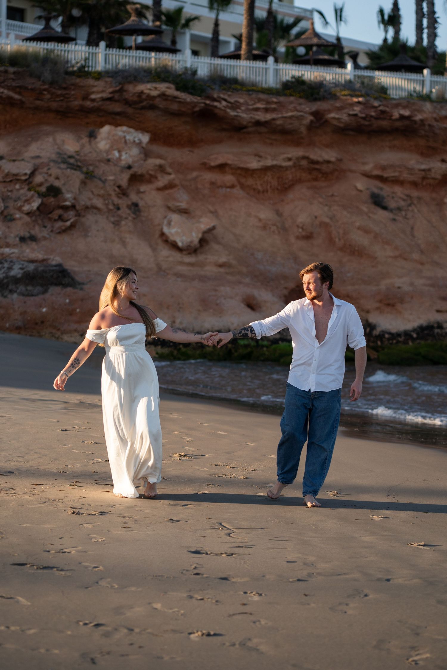 candid couple photos walking sunset