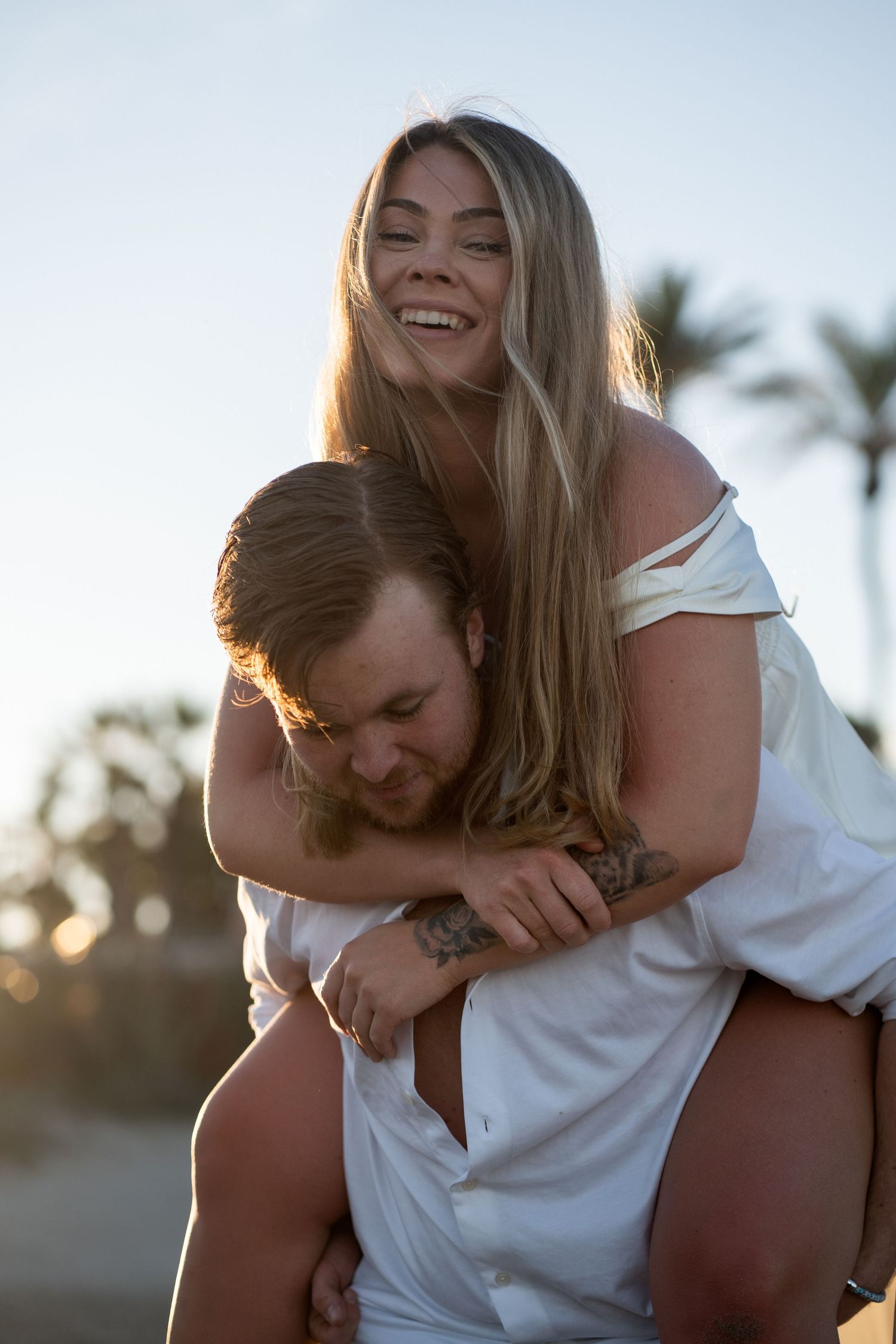 fun laughing couple shoot summer