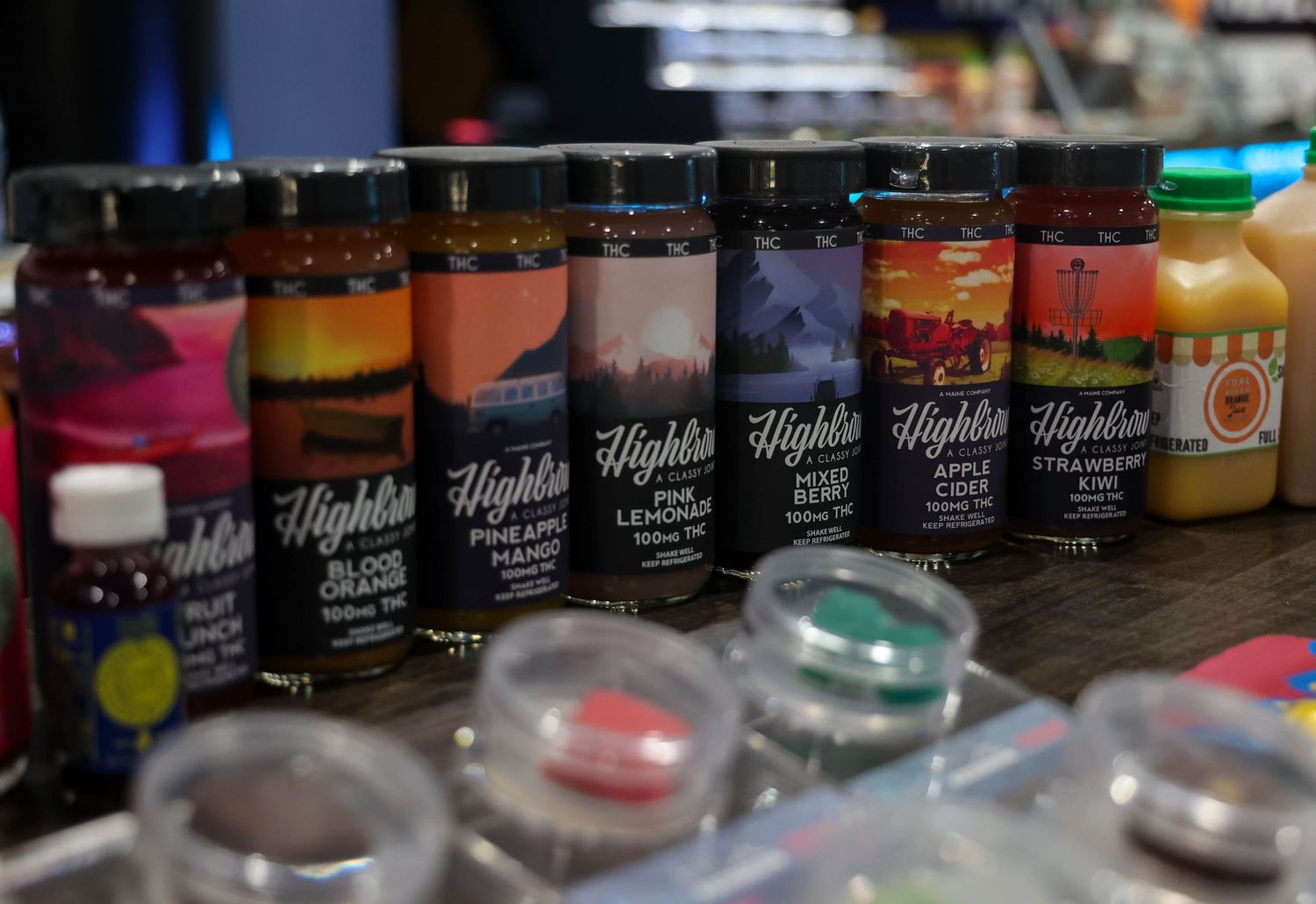 brand product image of the menu lineup of medicinal use drinks and snacks on a business counter
