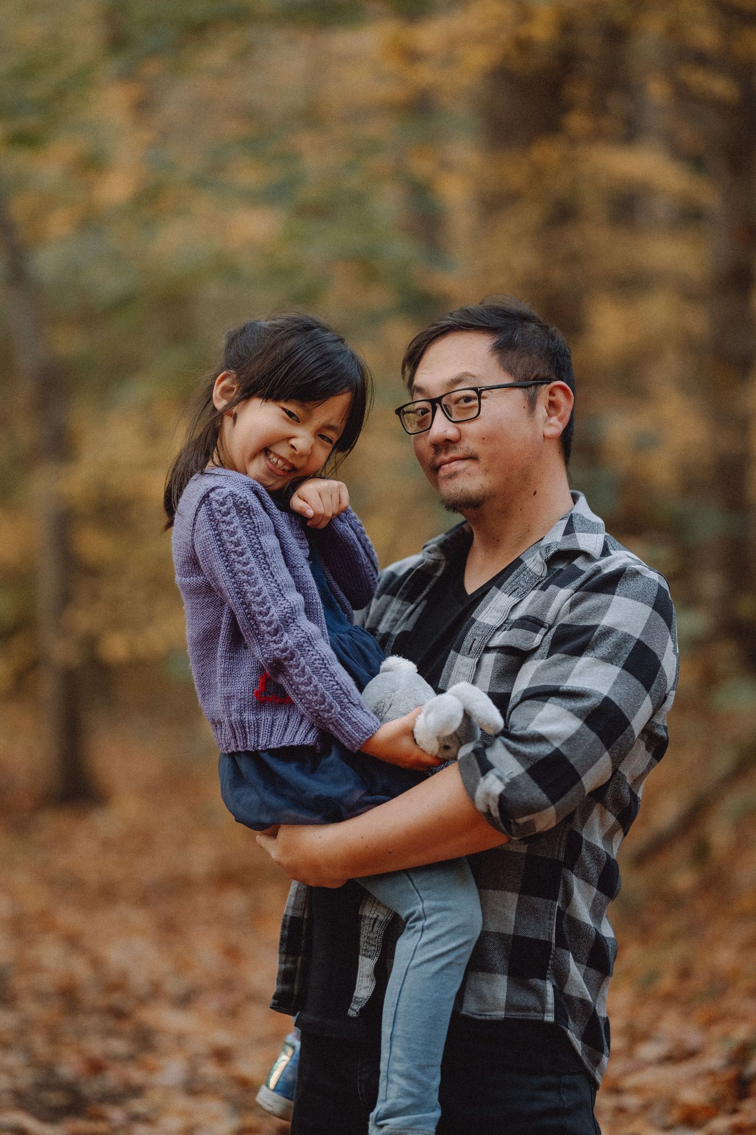 photo of Heartfelt Studio owner holding his daughter