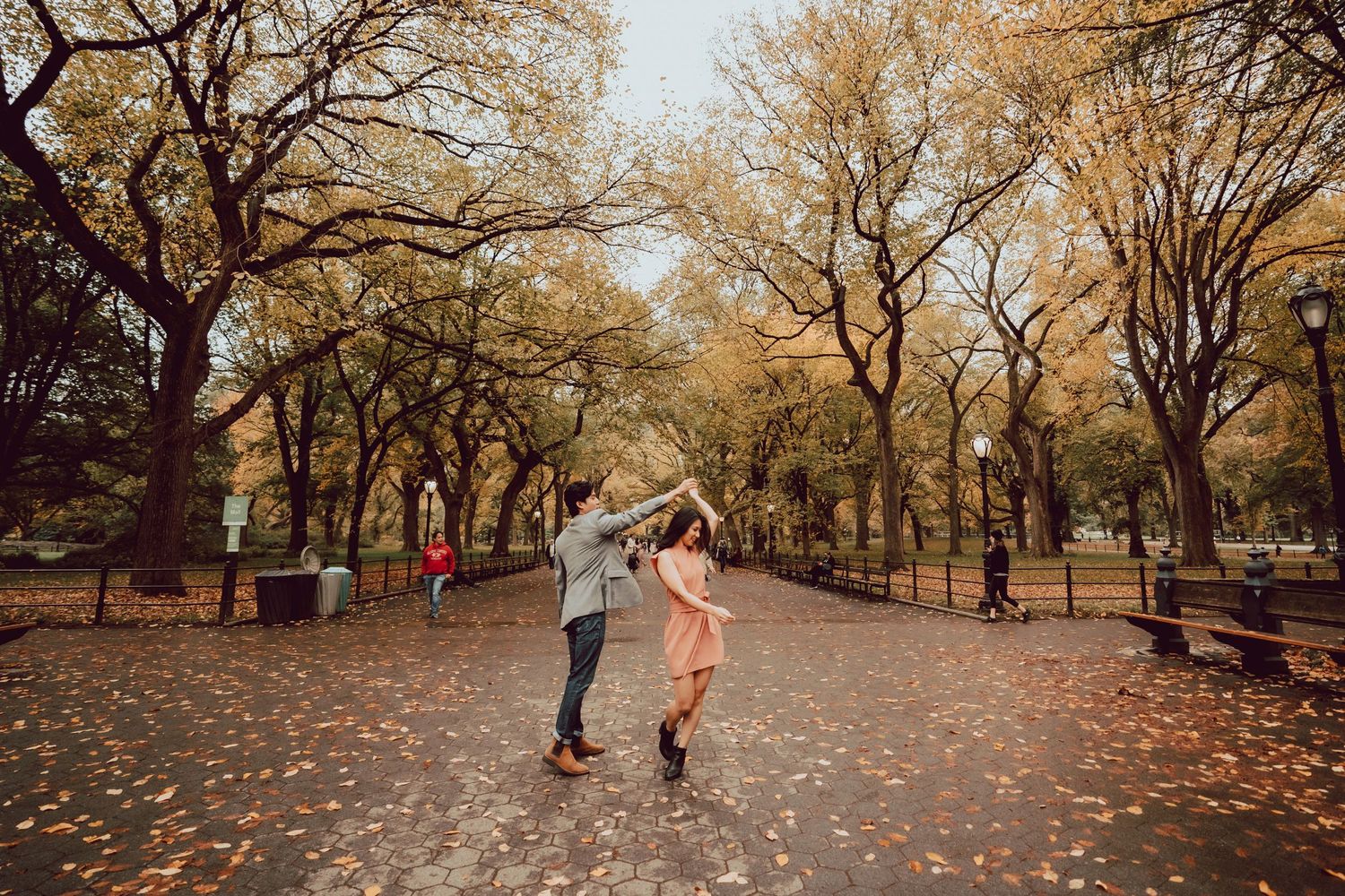 a fall engagement session in Central Park at the Mall
