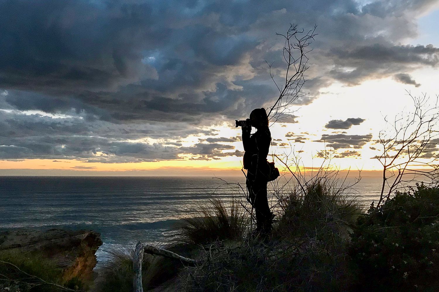 Lisa photographing sunset at the beach