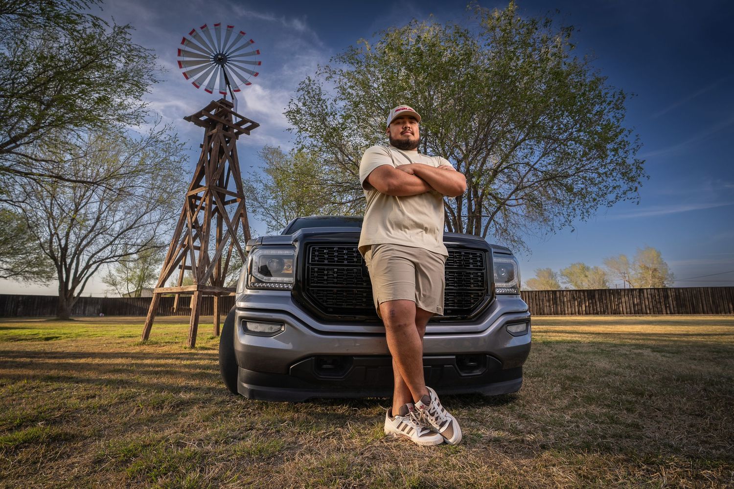 A series of photos showing a windmill silhouette and car against a dramatic sunset sky in a rural setting.