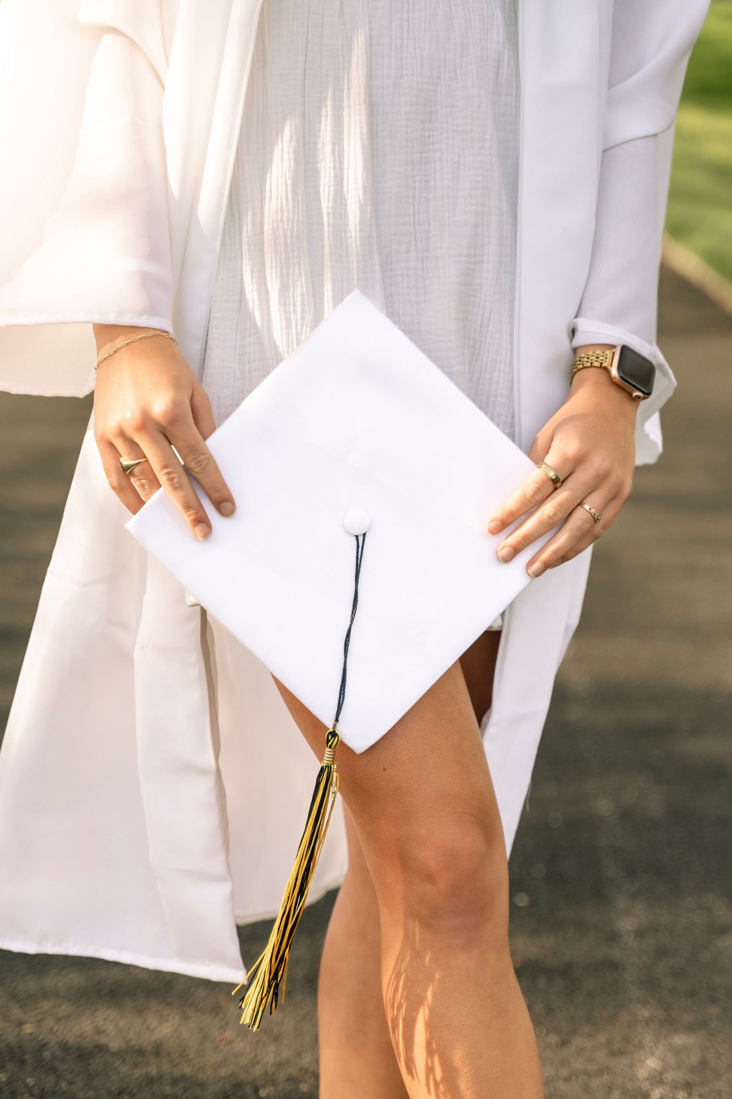 Harford county senior photos, white graduation cap and gown senior photo pose