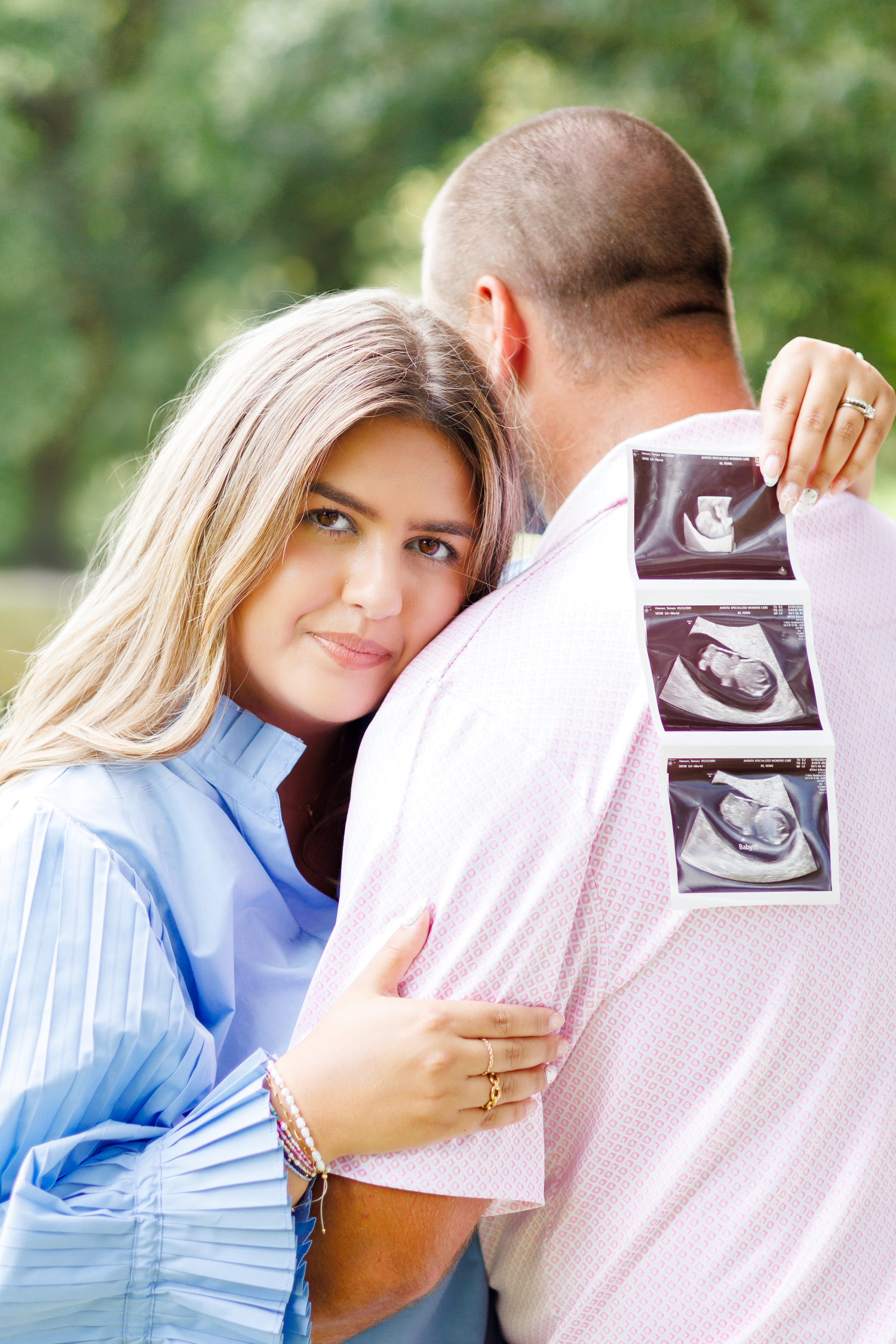 Couple smiles while holding a series of ultrasound photos in a pregnancy announcement collage.