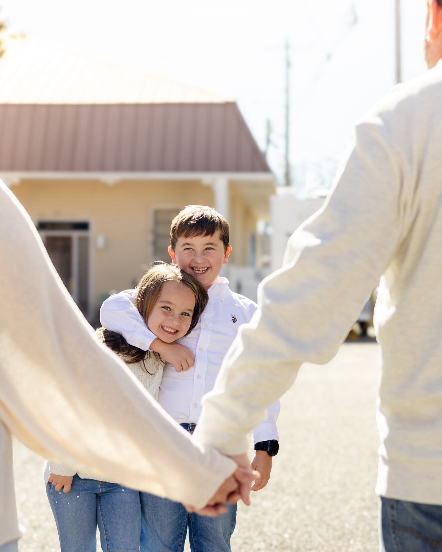 A series of three connected photos showing a playful moment between people outdoors on a bright sunny day.