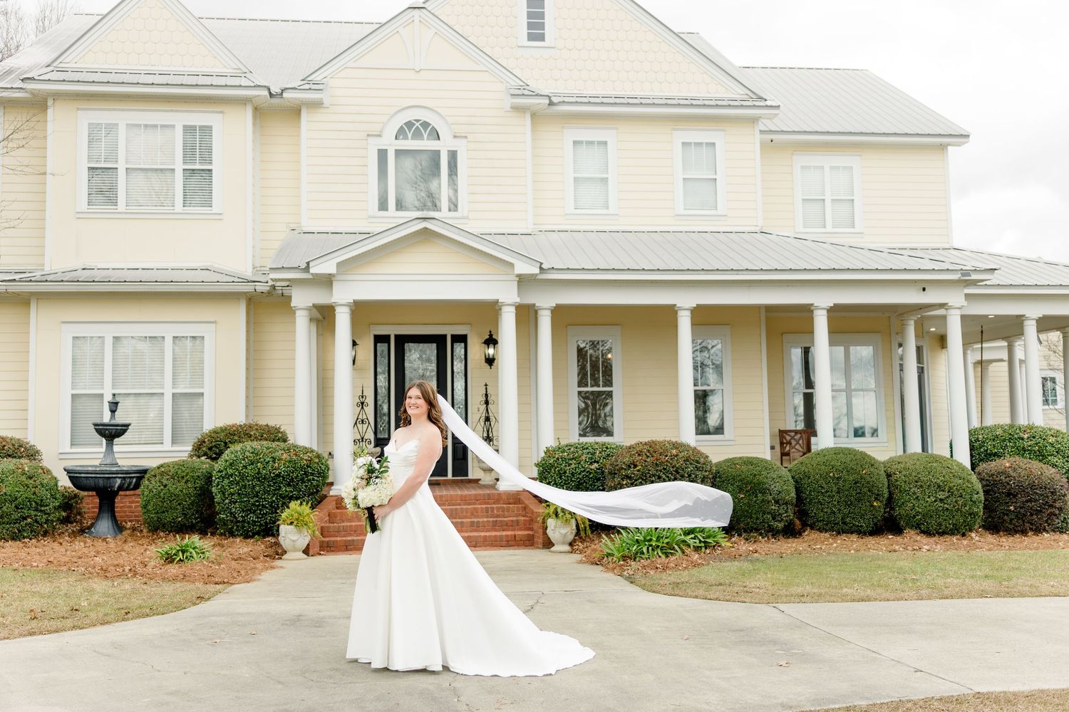 A series of exterior shots showing a white colonial style house with pillars and manicured landscaping.