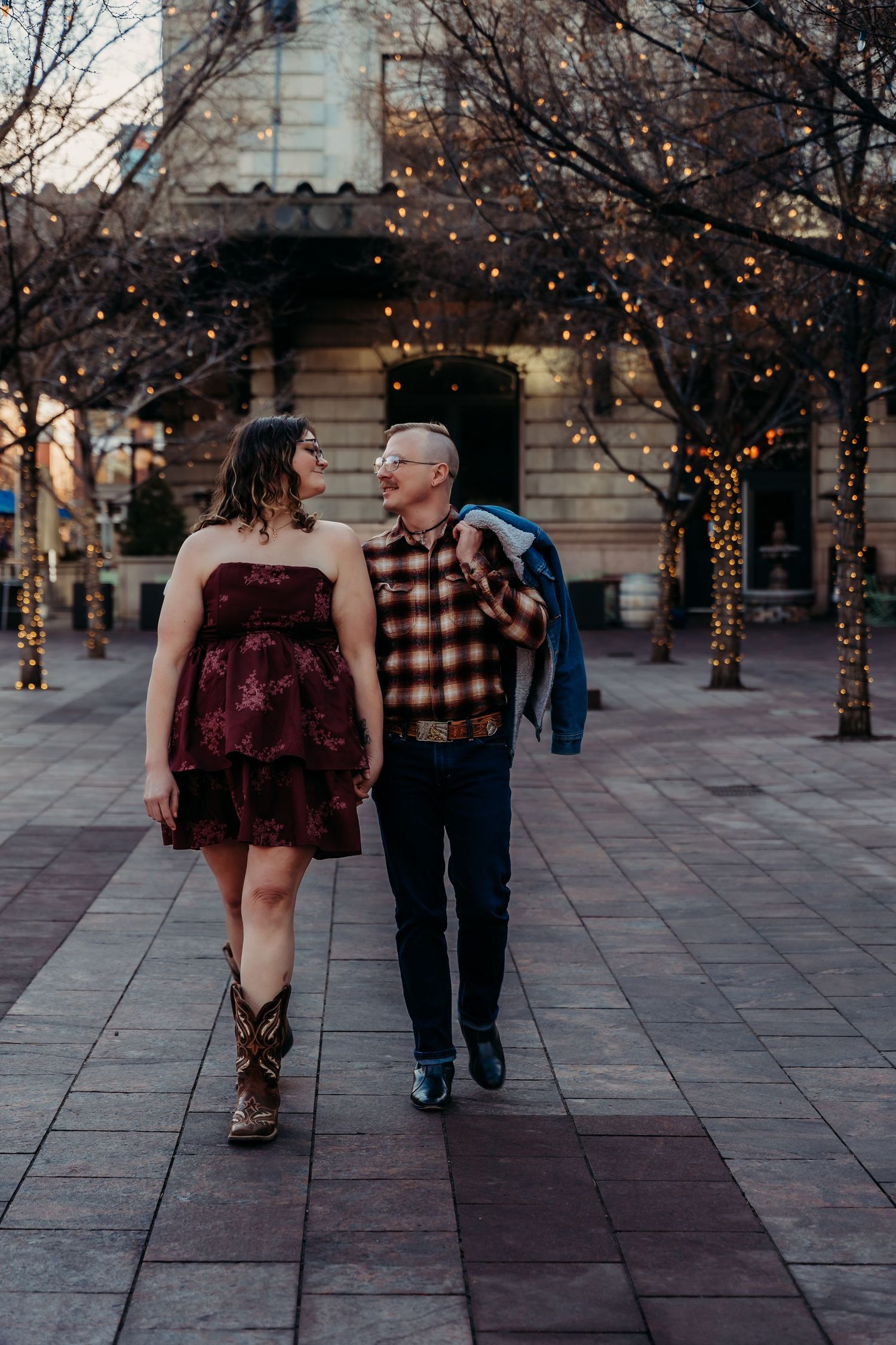 A couple walking together outside of Union Station in Downtown Denver, Colorado