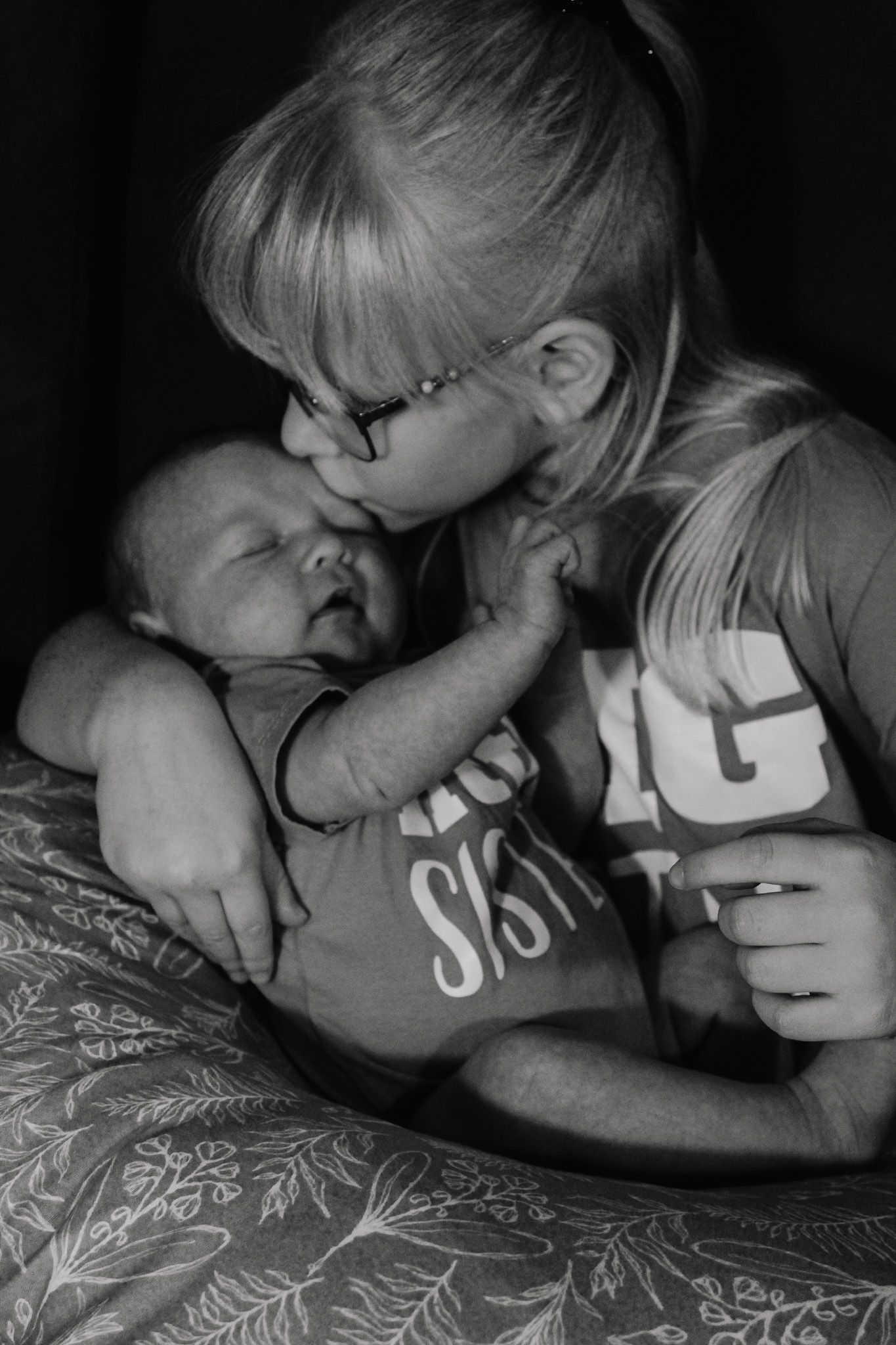 Tender black and white portrait of nurturing moment.
