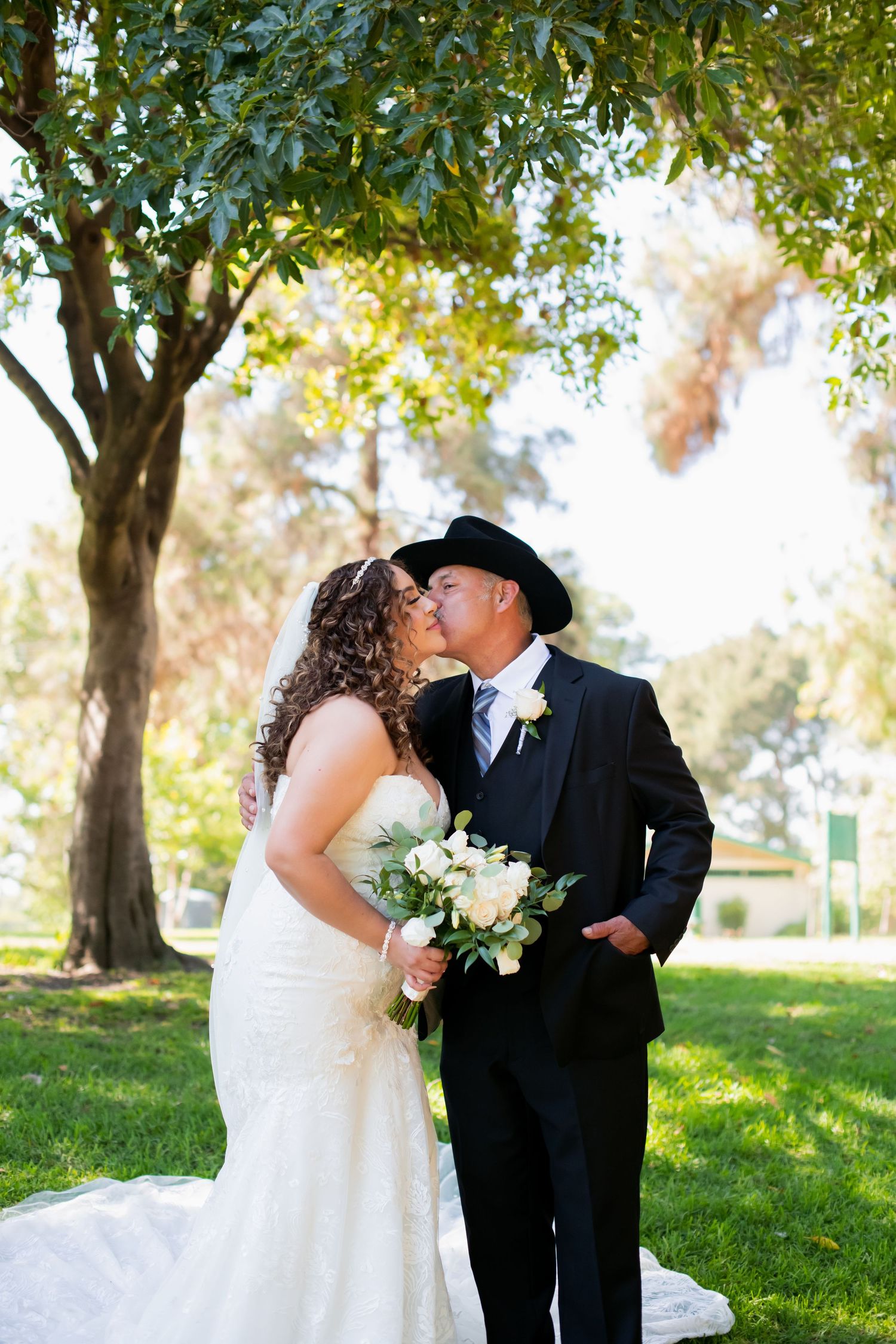Romantic wedding photos captured in a serene outdoor garden setting with beautiful natural lighting.