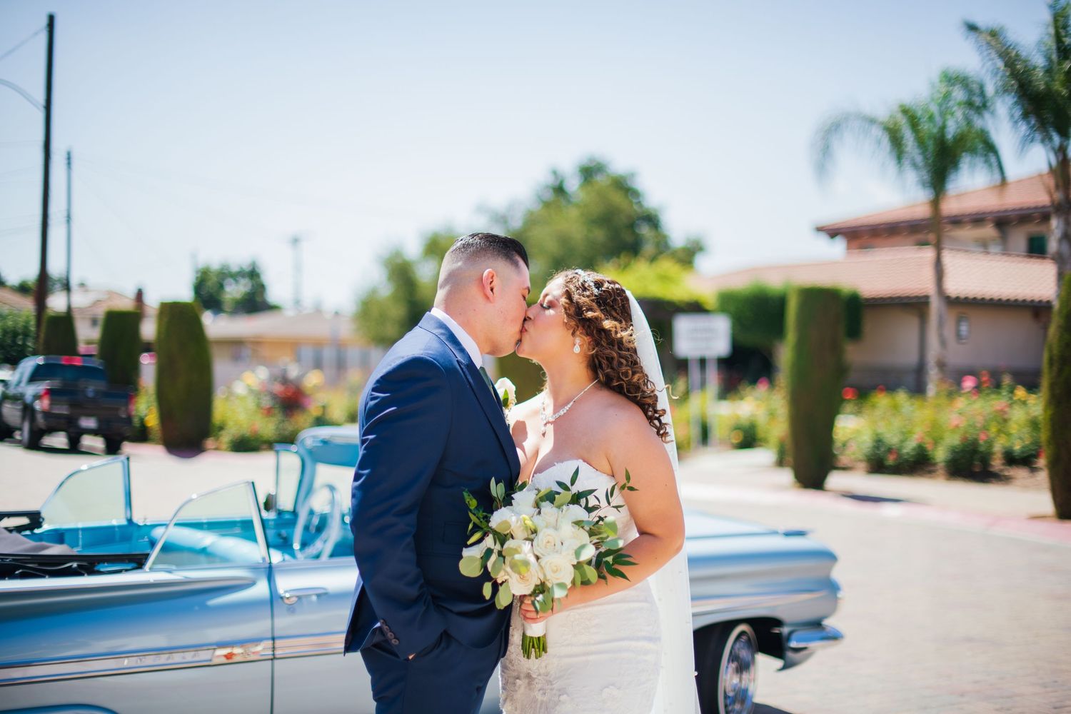 Wedding ceremony setup at Our Lady of Guadalupe Catholic Church El Monte venue with blue accents and florals.
