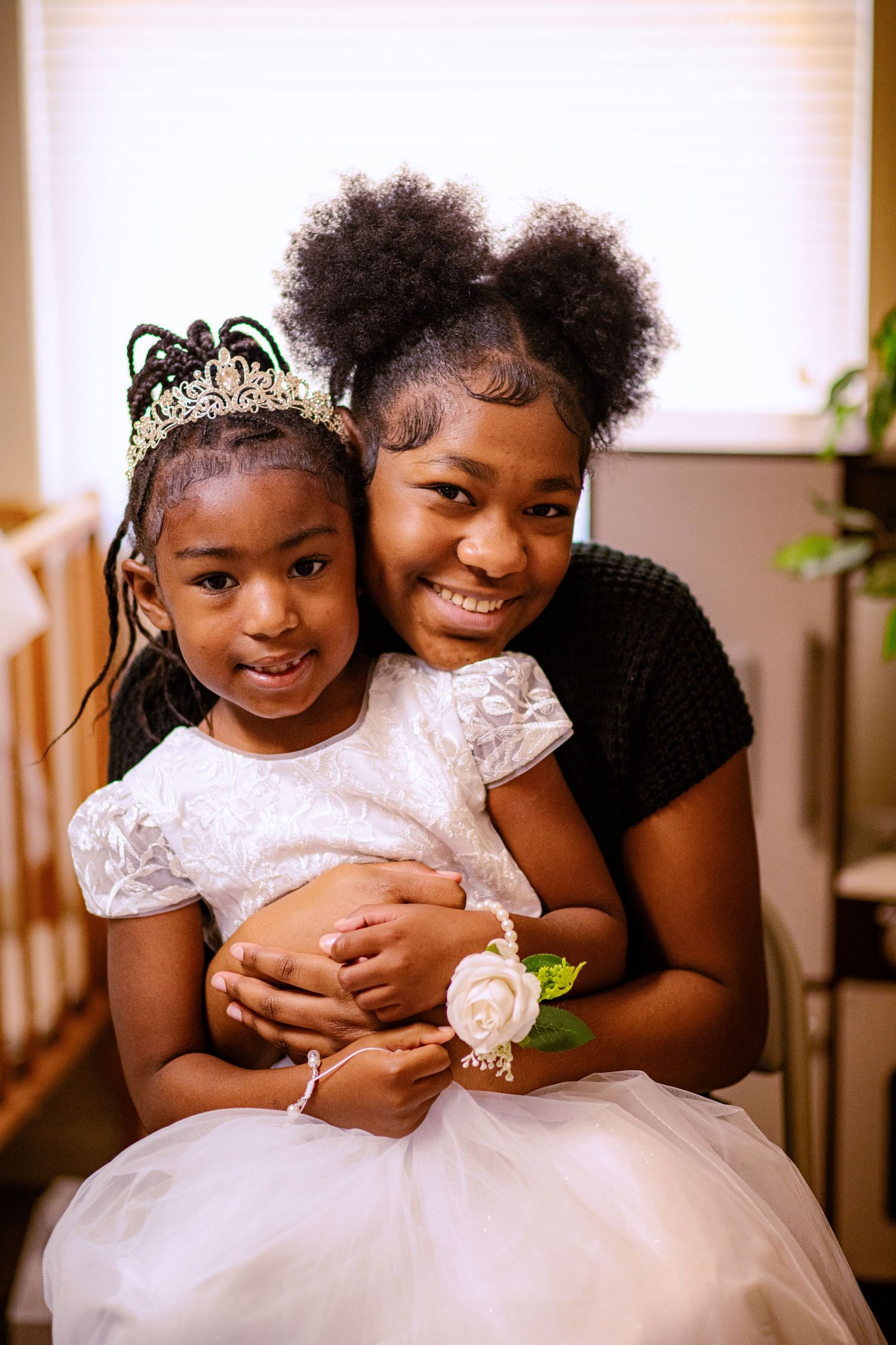A series of candid moments showing a parent and child in white dresses sharing joyful embraces and laughter.