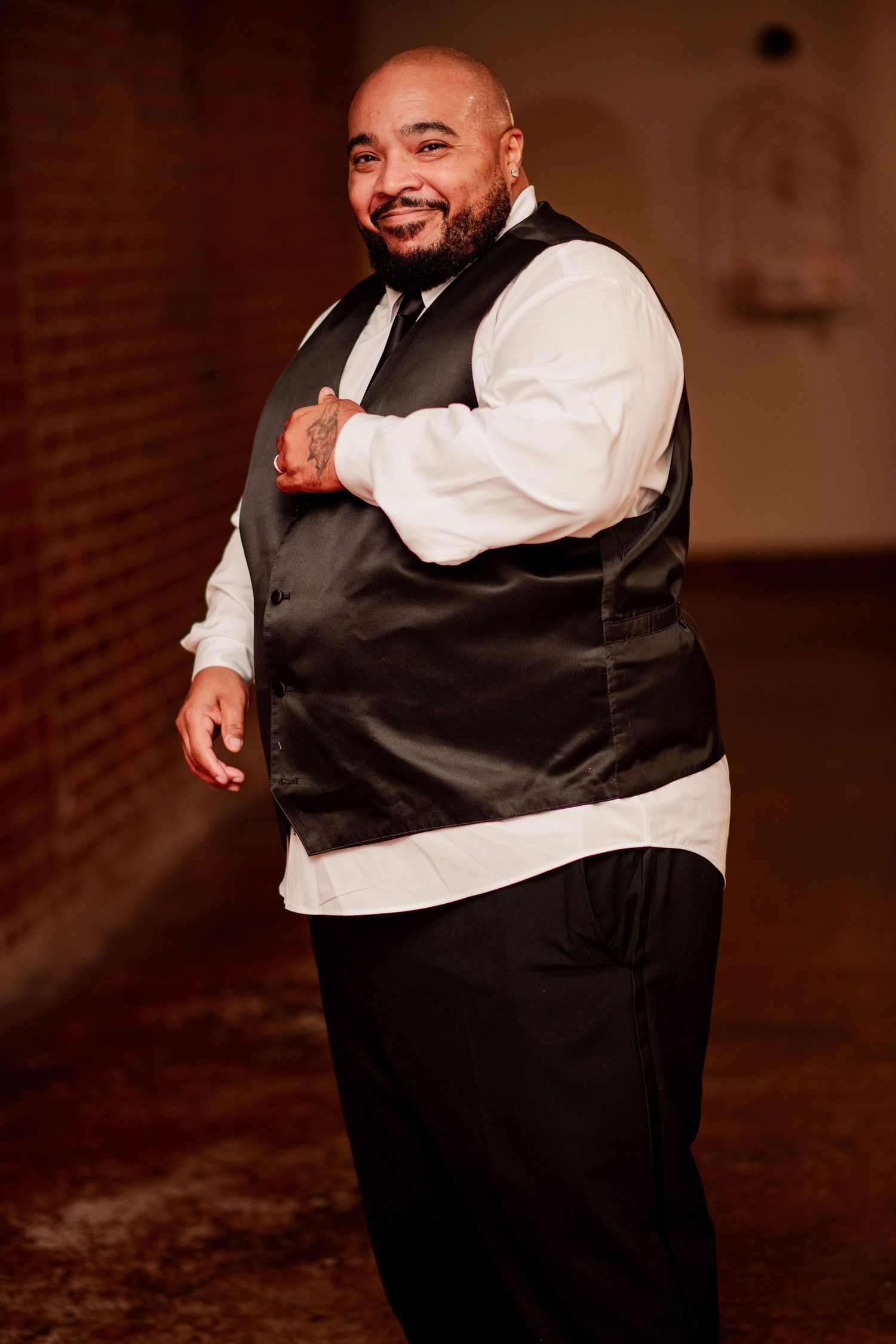 Groom in formal black vest and white shirt poses playfully in multiple candid shots.