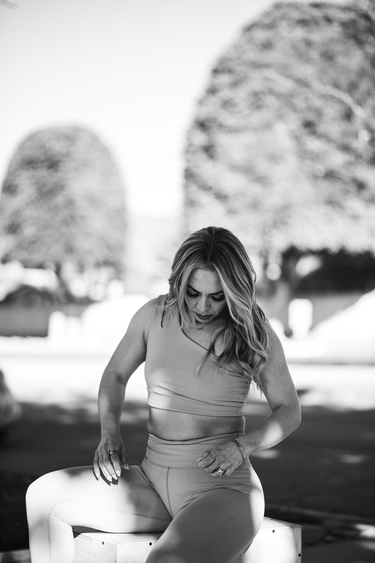 Black and white portrait series showing dynamic poses in natural lighting.