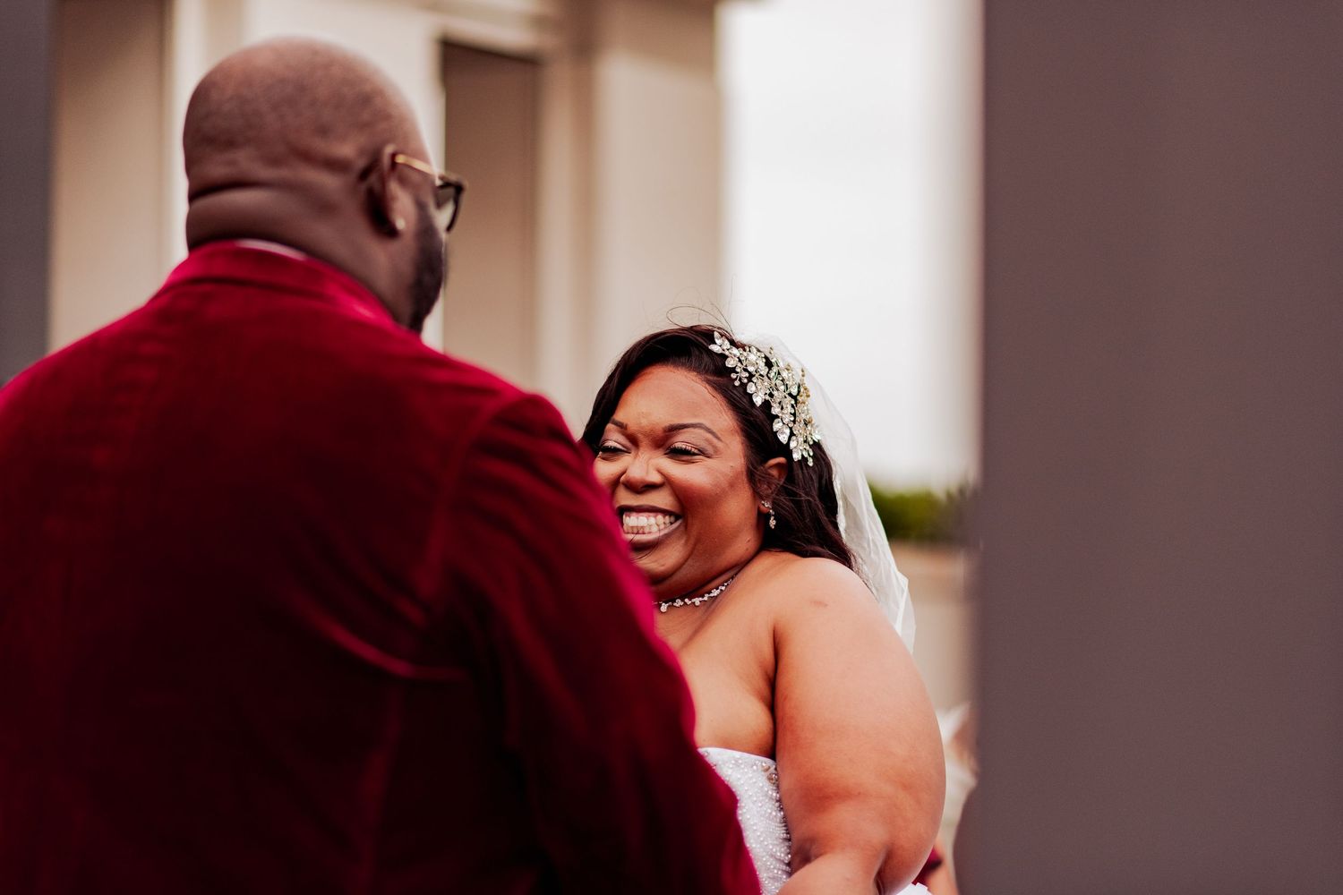 Wedding celebration candid moments showing joyful reactions and emotions.