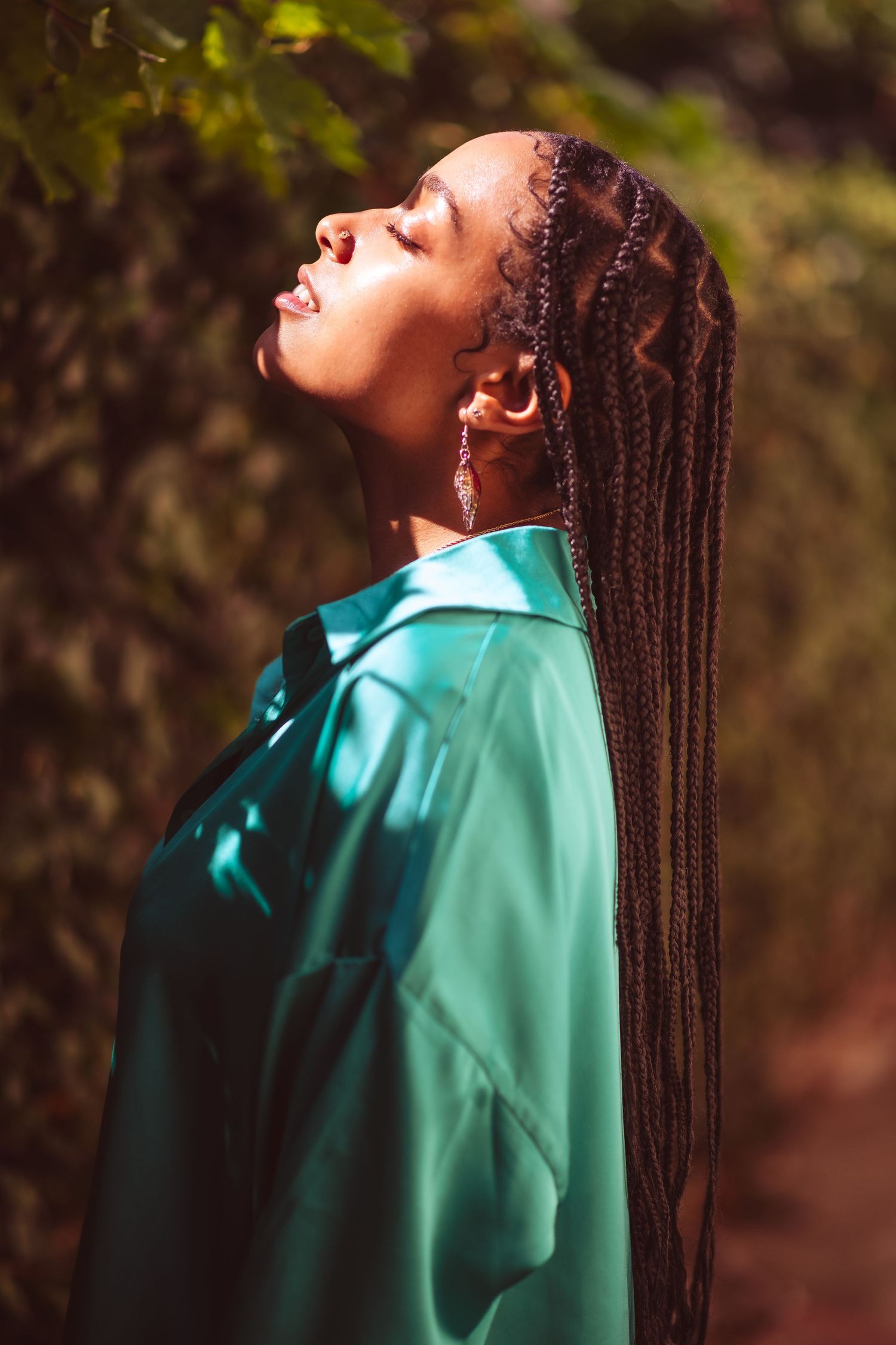 Jade Vanessa R&B Artist Afro Latina
her Profile portrait sequence in turquoise clothing showing upward gazes against a natural background.