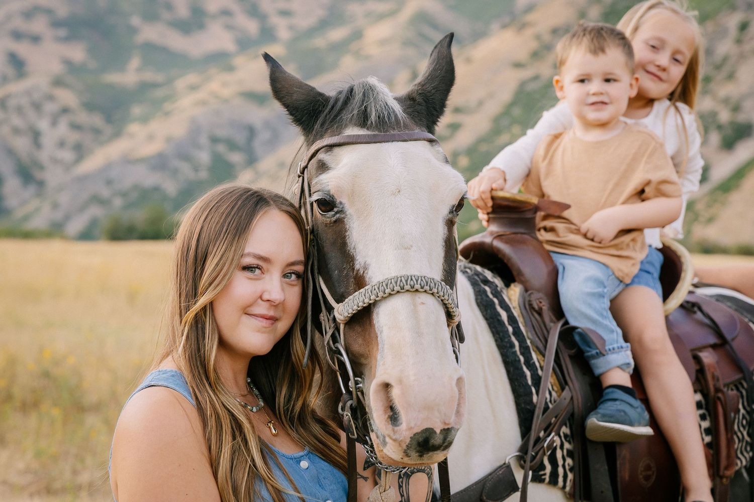 A series of candid outdoor photos showing people with horses in a scenic mountain landscape.