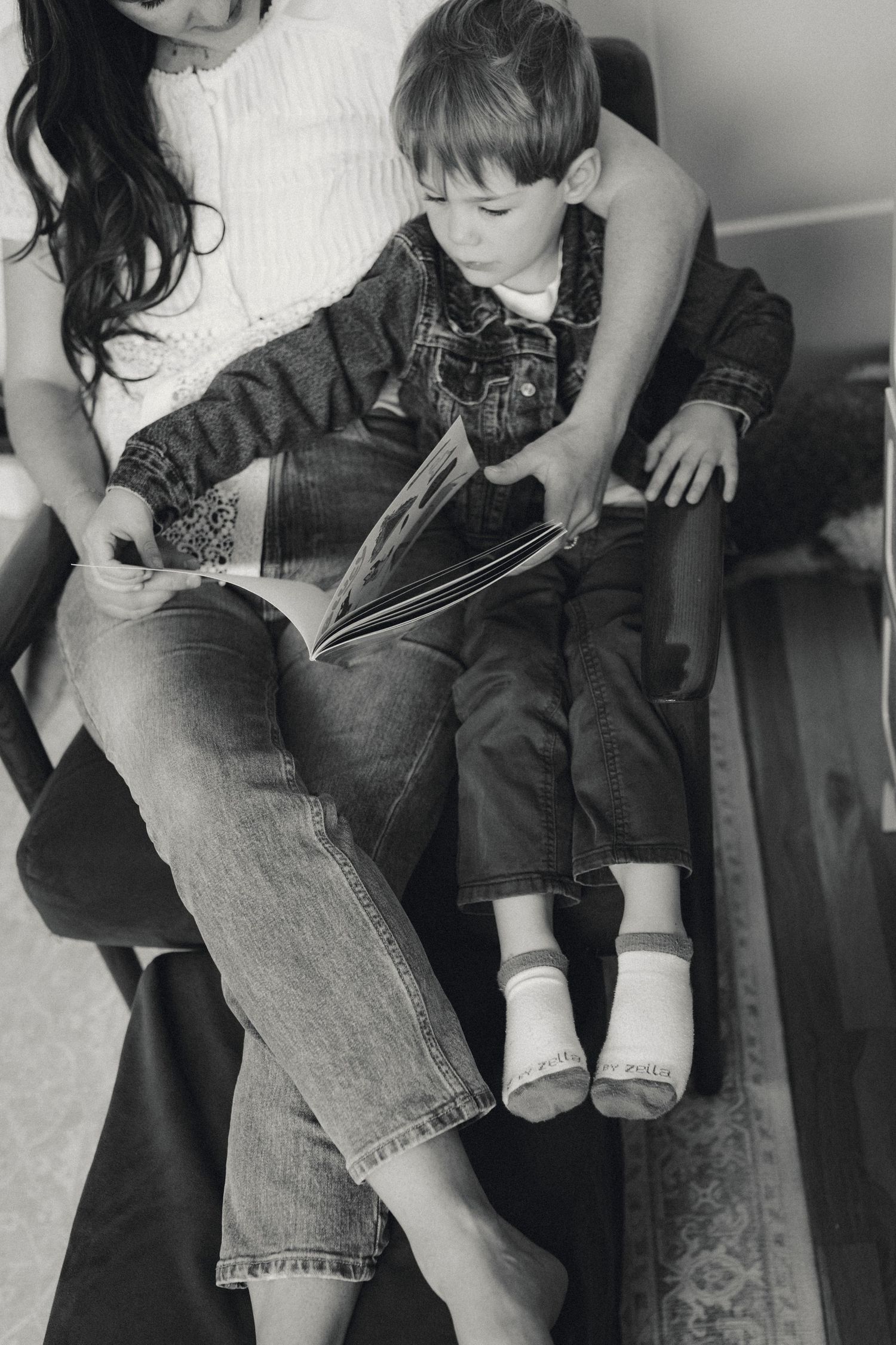 Black and white casual family photos showing relaxed poses in denim.