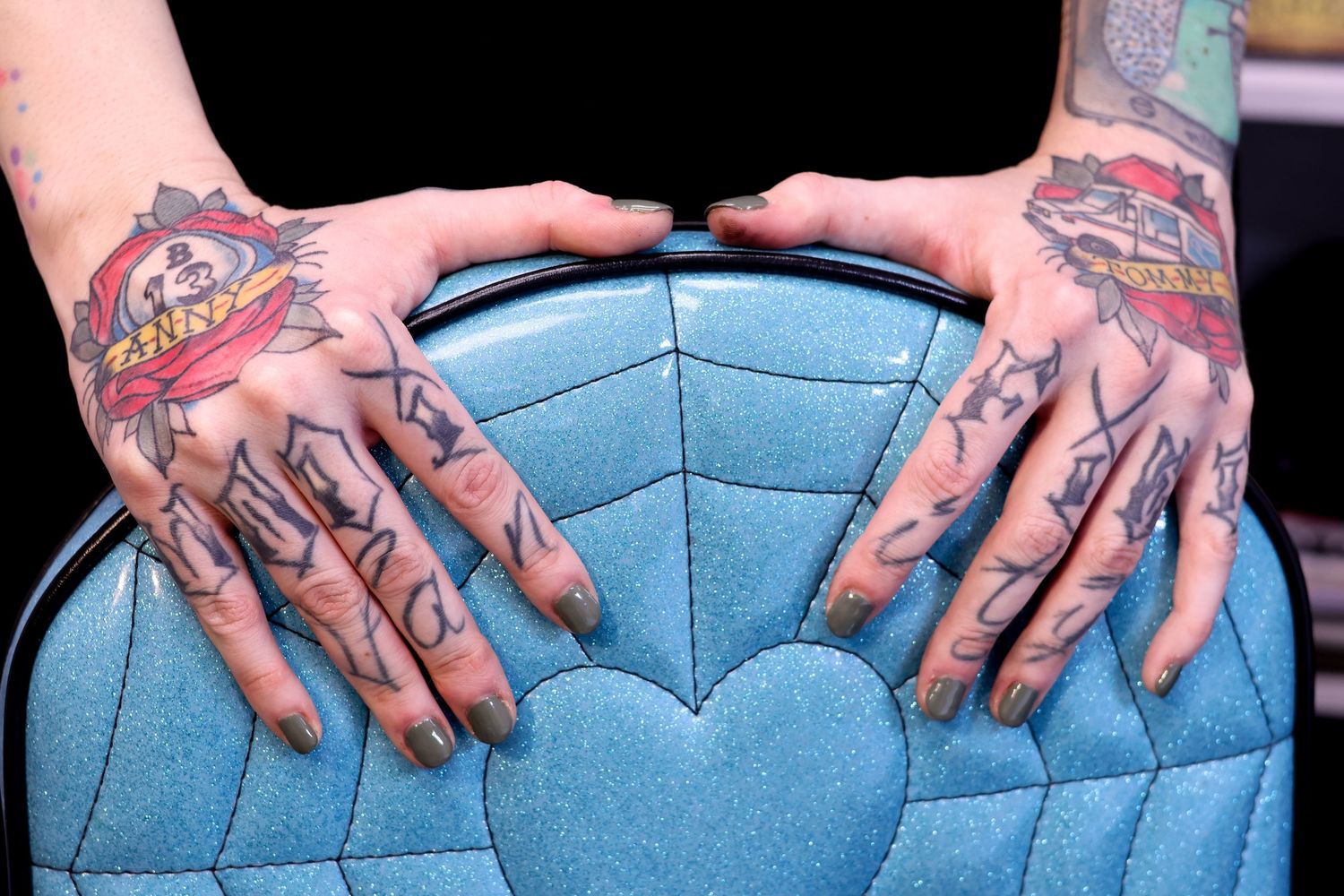 A sequence of hands demonstrating proper massage techniques on a person wearing blue denim jeans.