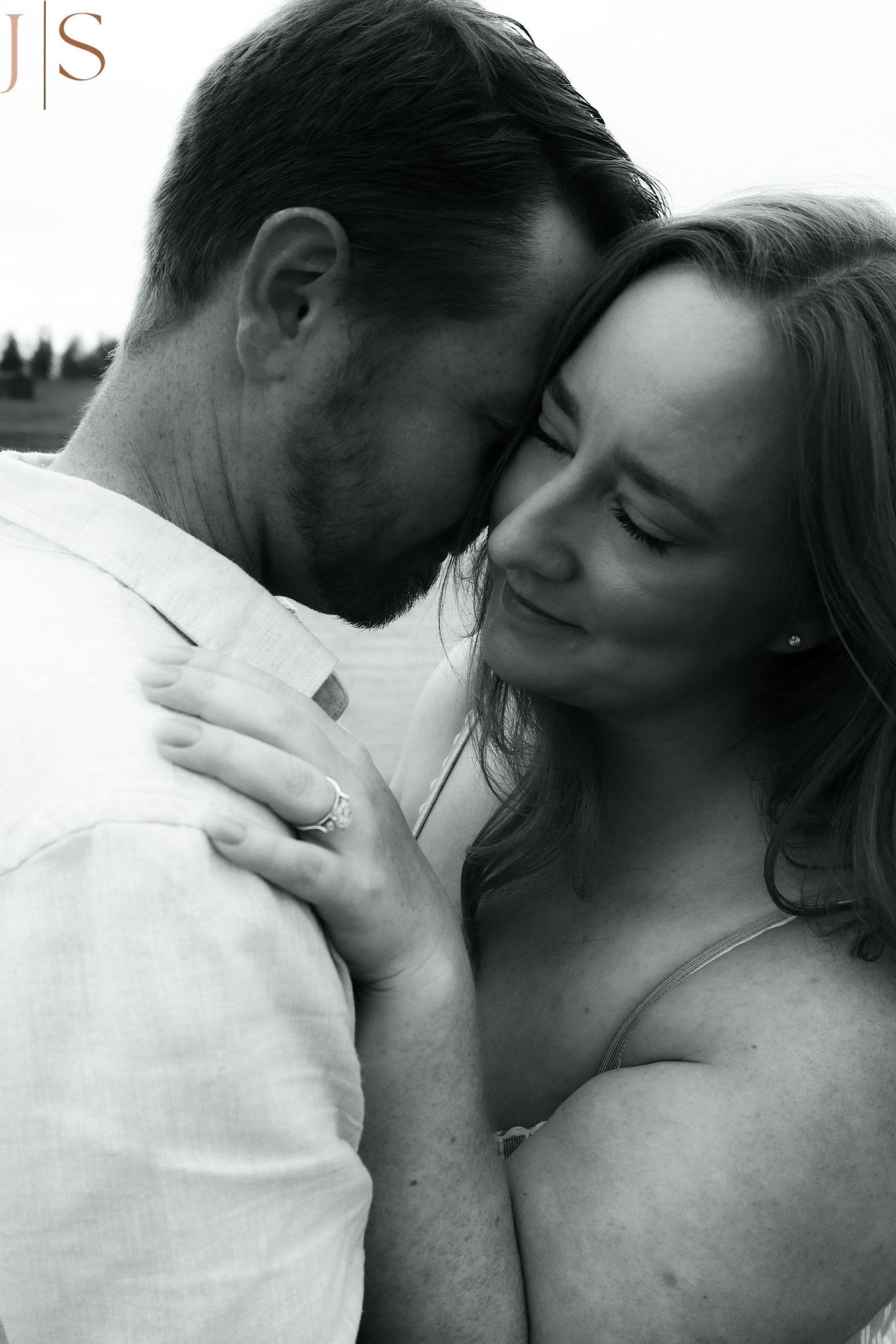 A romantic black and white photo sequence showing an intimate moment between a couple.