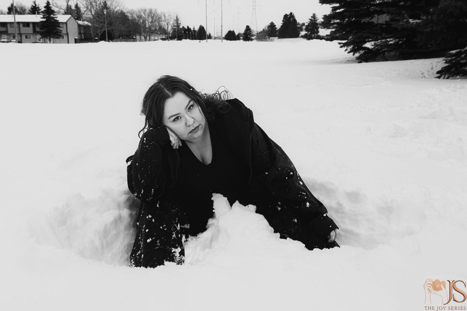 Artistic black and white winter photography series in deep snow.