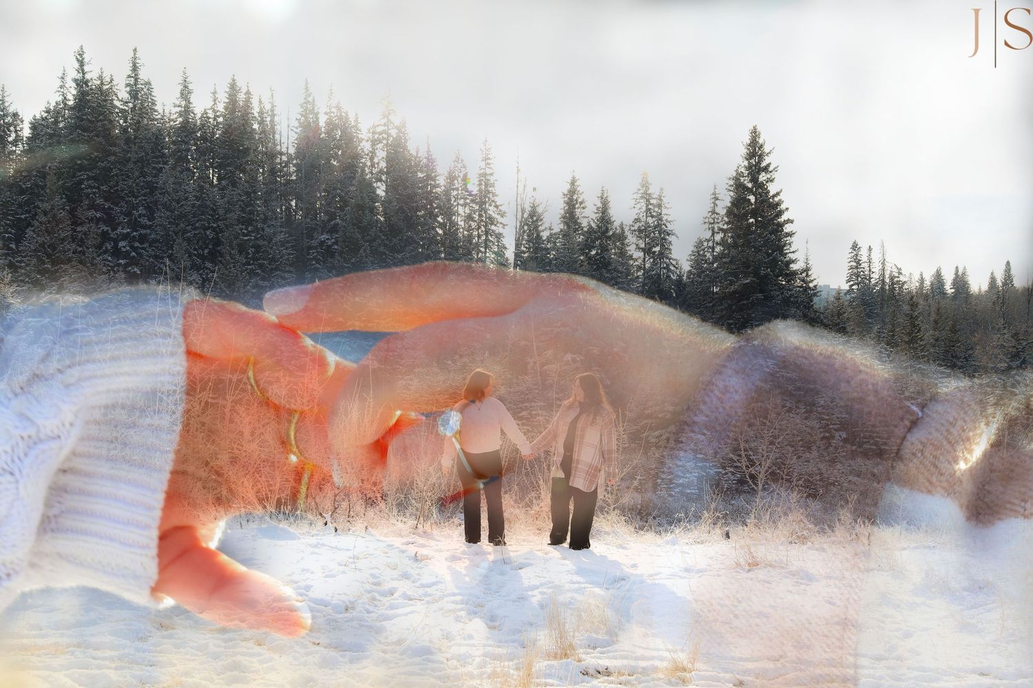 Two figures stand in a snowy winter forest landscape with an ethereal double exposure effect.