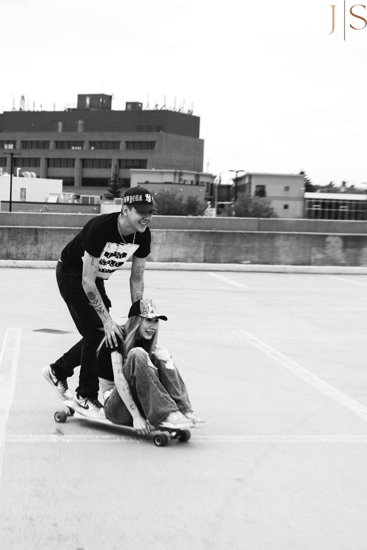 Black and white sequence shows a skateboarding trick progression on an empty rooftop.