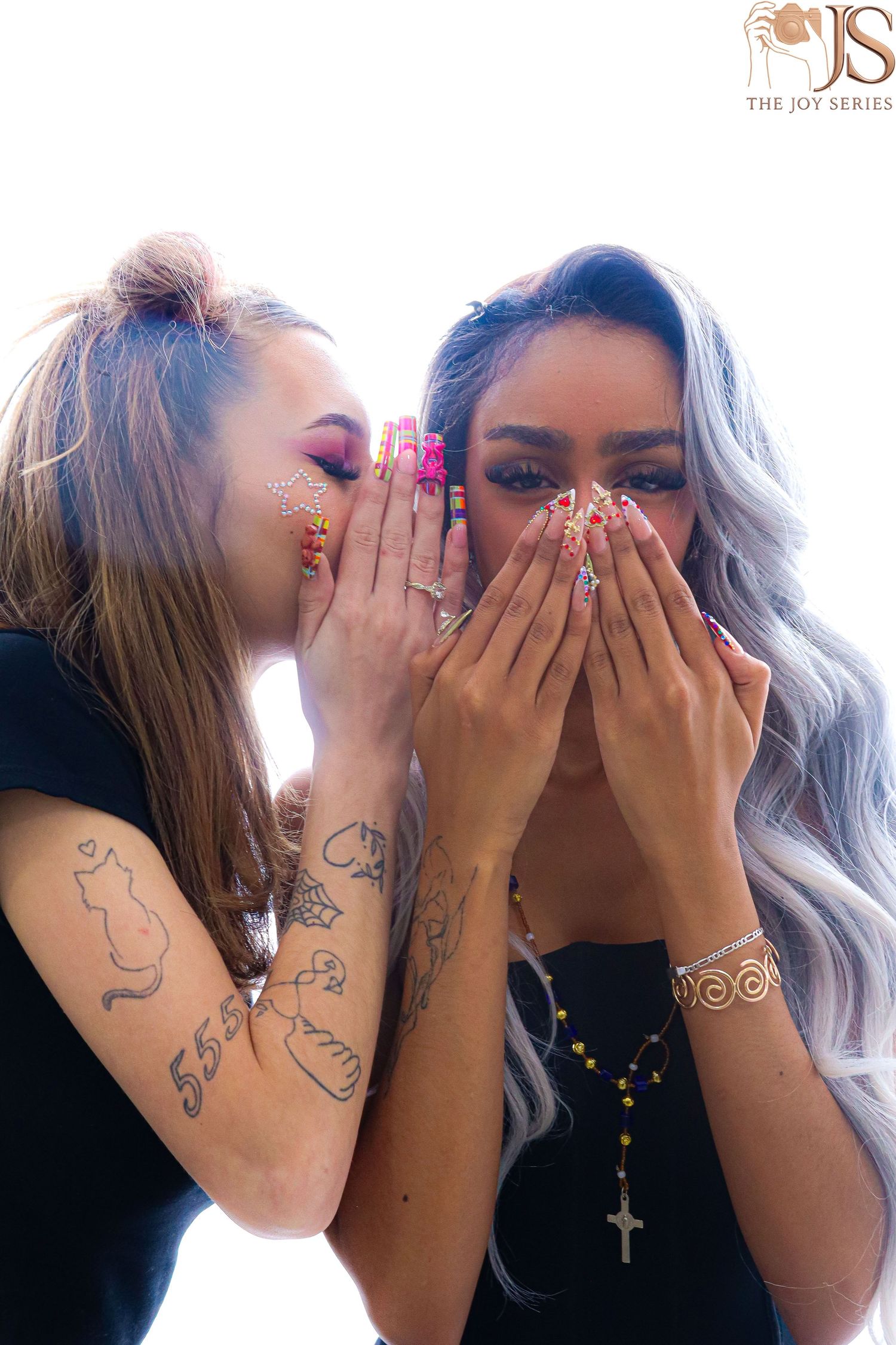 Multiple photos showing people covering their faces with hands decorated with sparkly nail polish and tattoos.