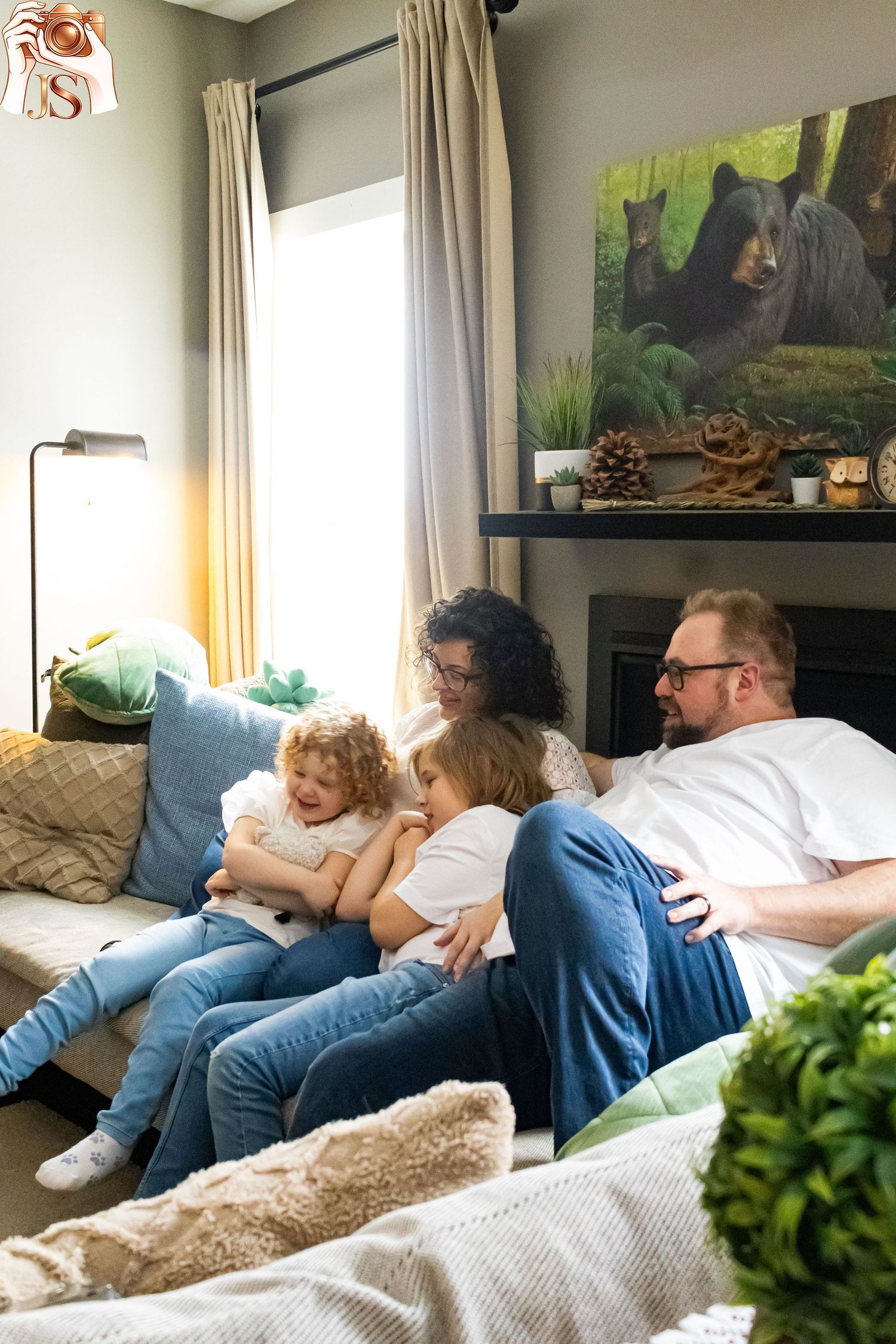 A series of five connected photos showing people relaxing together on a couch with a plush blanket and decorative greenery.
