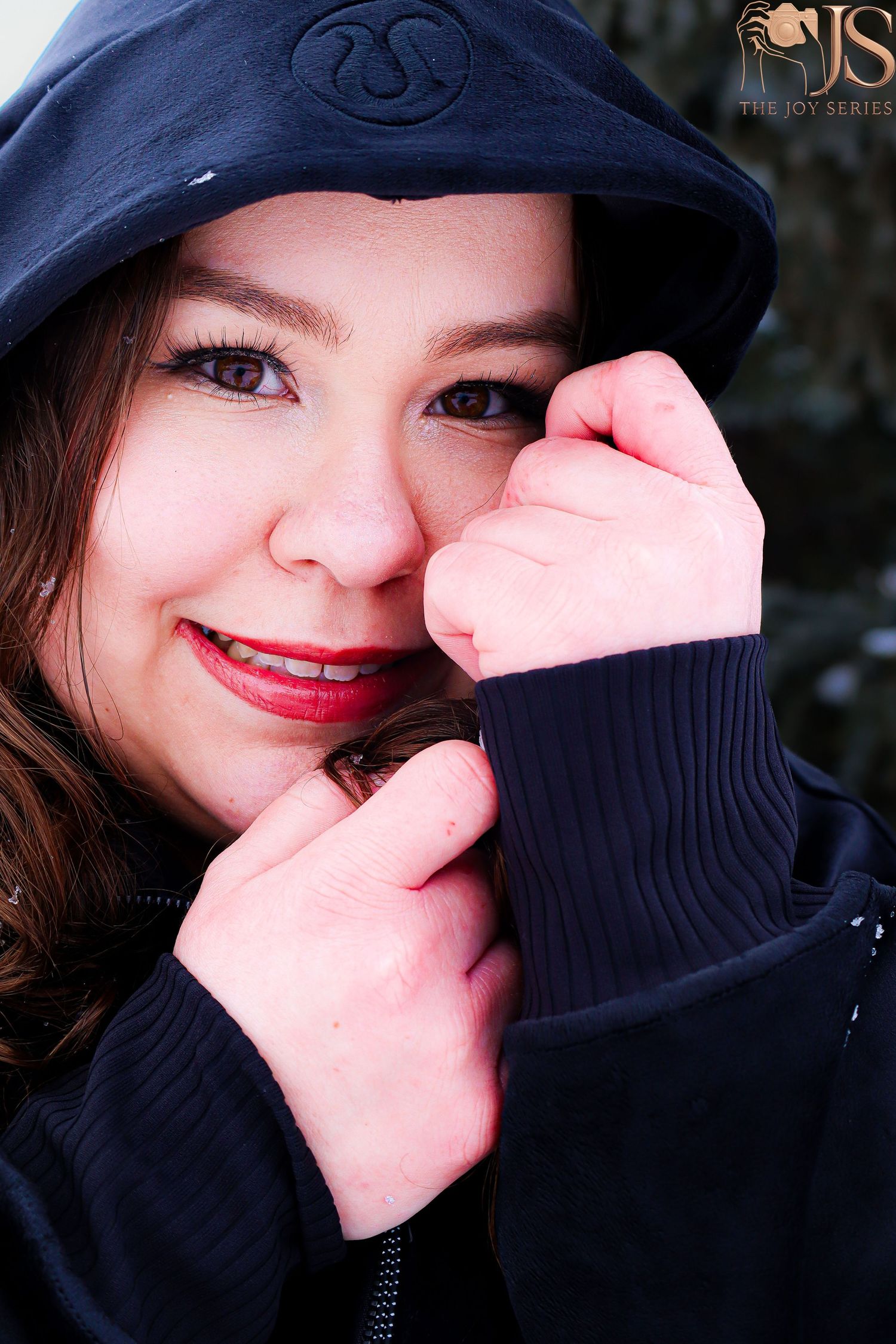 Close-up portrait series showing playful expressions while wearing a dark cap and sweater.