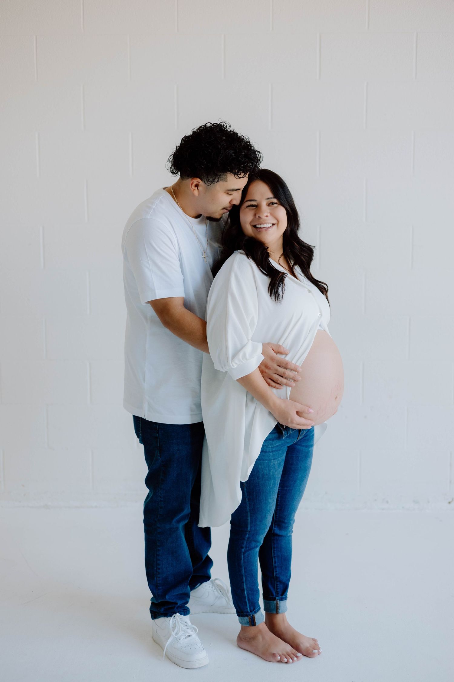 Intimate couple portraits against a clean white background.