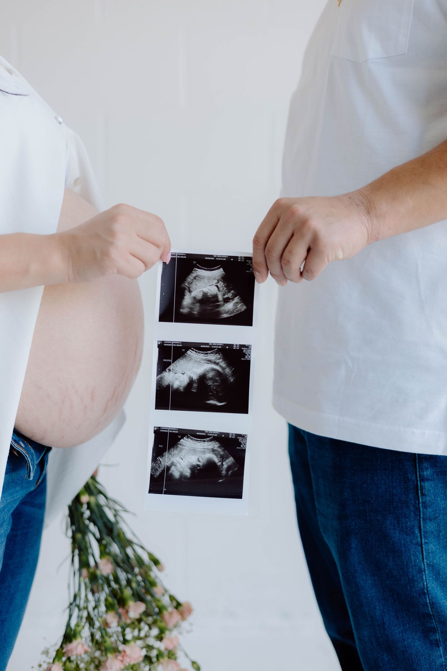 Pregnancy announcement photos with ultrasound images and belly shots.