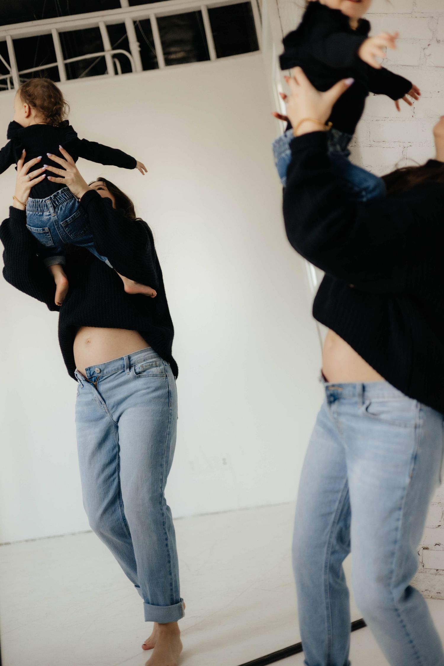 Playful dance movements captured in a series against a minimalist white backdrop.