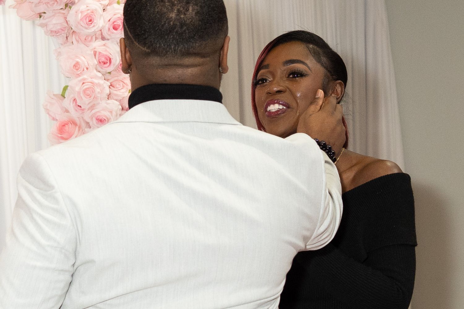 Joyful reaction captured during surprise proposal moment.
