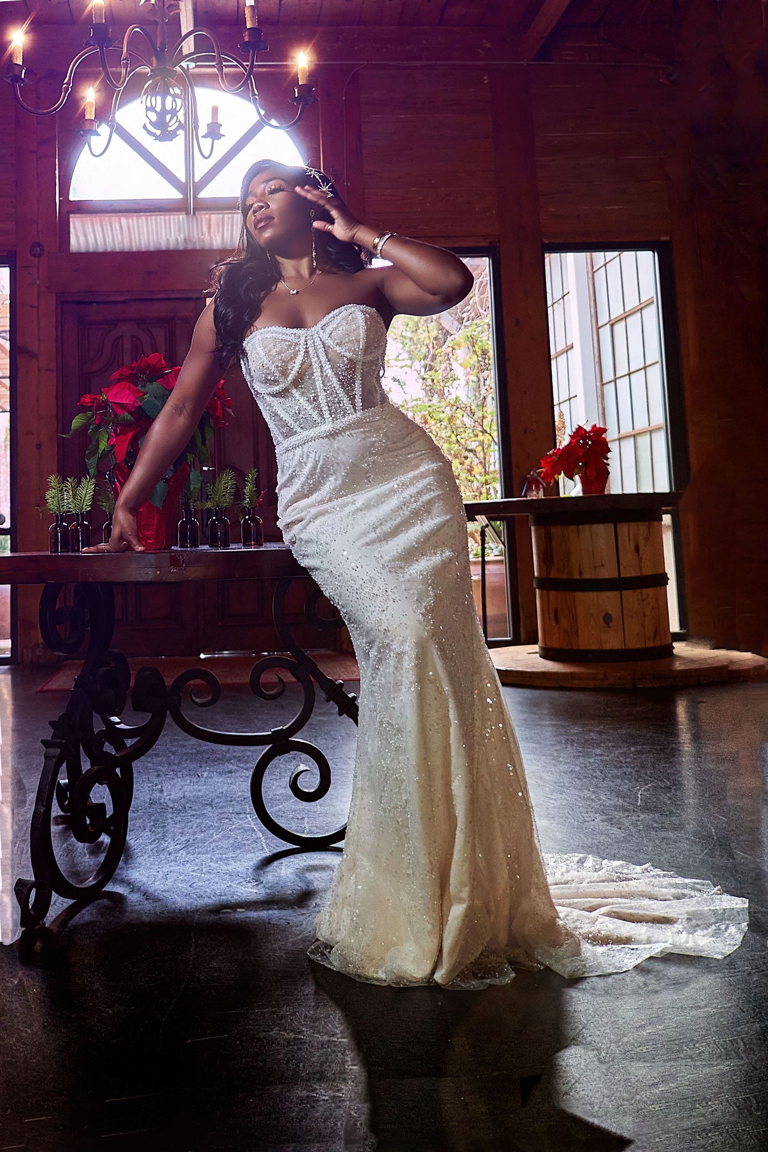Elegant bridal portraits showing white wedding dress details in rustic venue setting.