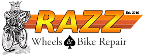 Logo design for Razz Wheels & Bike Repair featuring a king playing card character on a bicycle.
