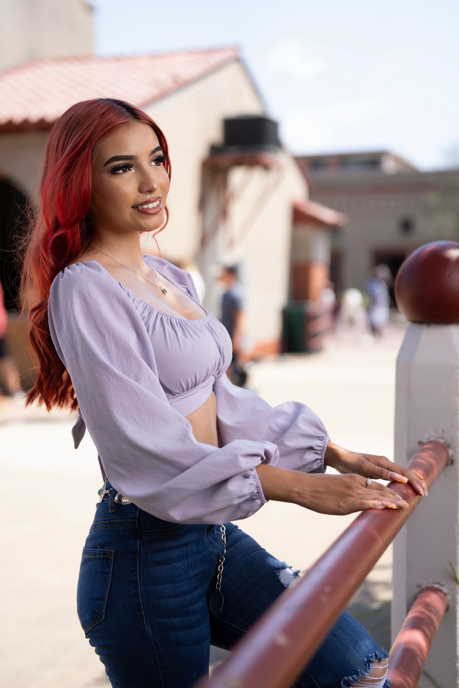 Portrait of a woman with red hair in an outdoor setting in Dallas-Fort Worth, photographed by DFW Dynamic Media.