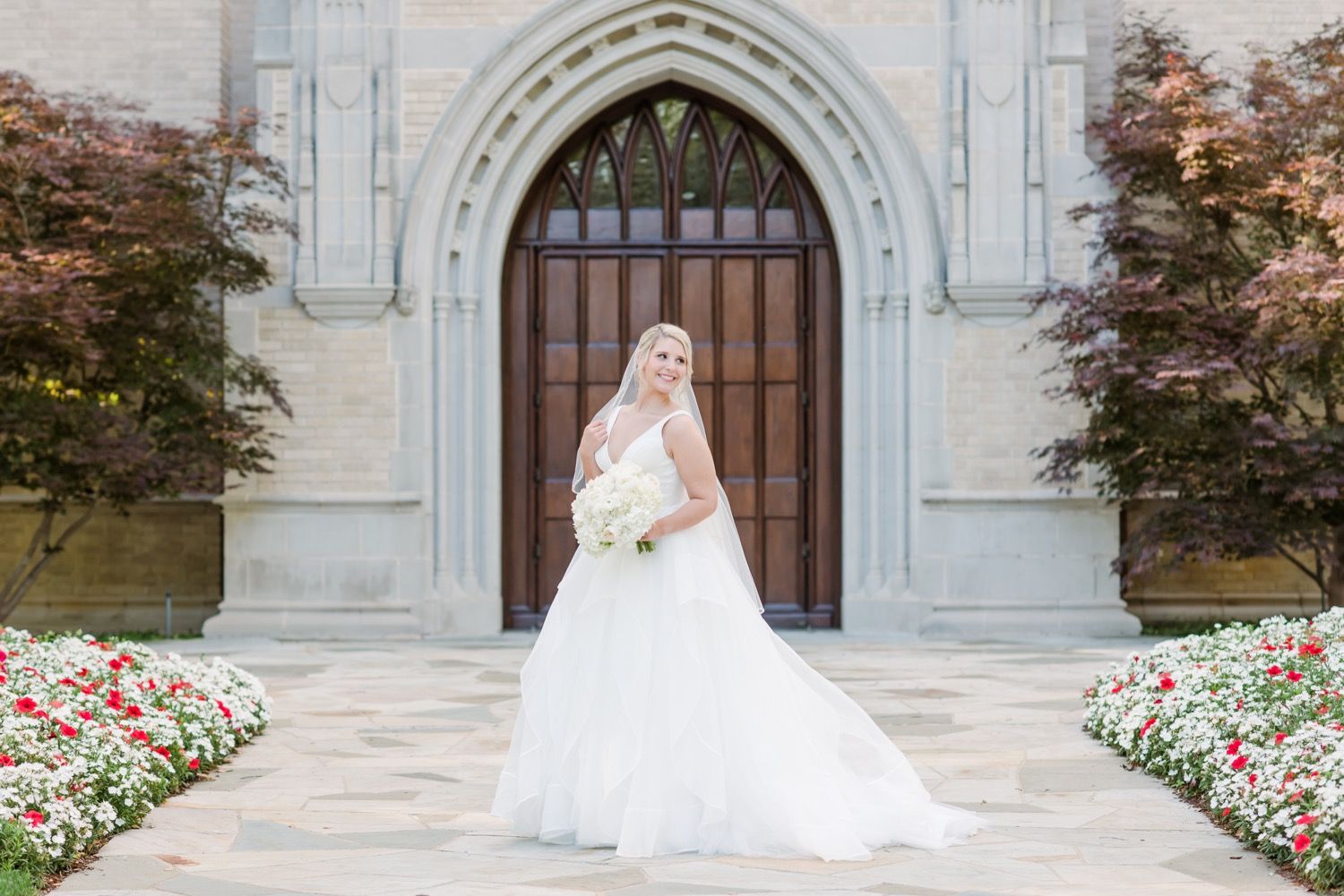 A montage of wedding photos showing a person in a flowing white gown against a gothic stone church exterior with blooming roses.