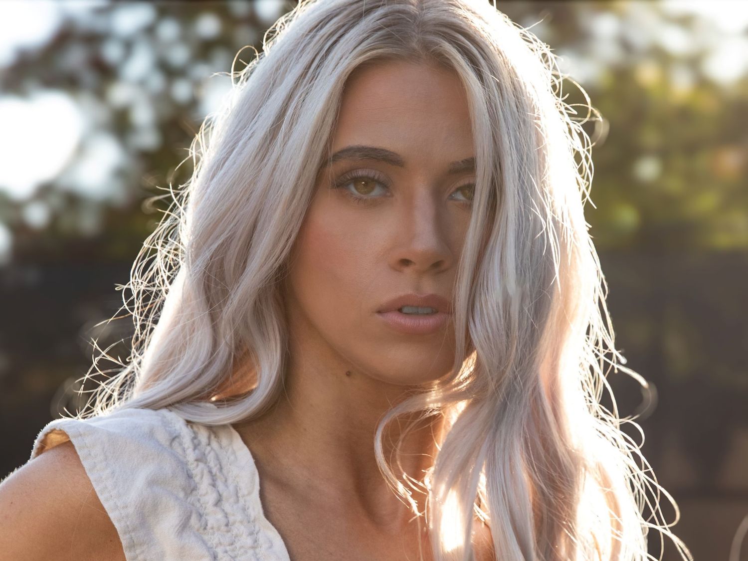 Atlanta ethereal portrait with backlit golden sunlight highlighting long hair.