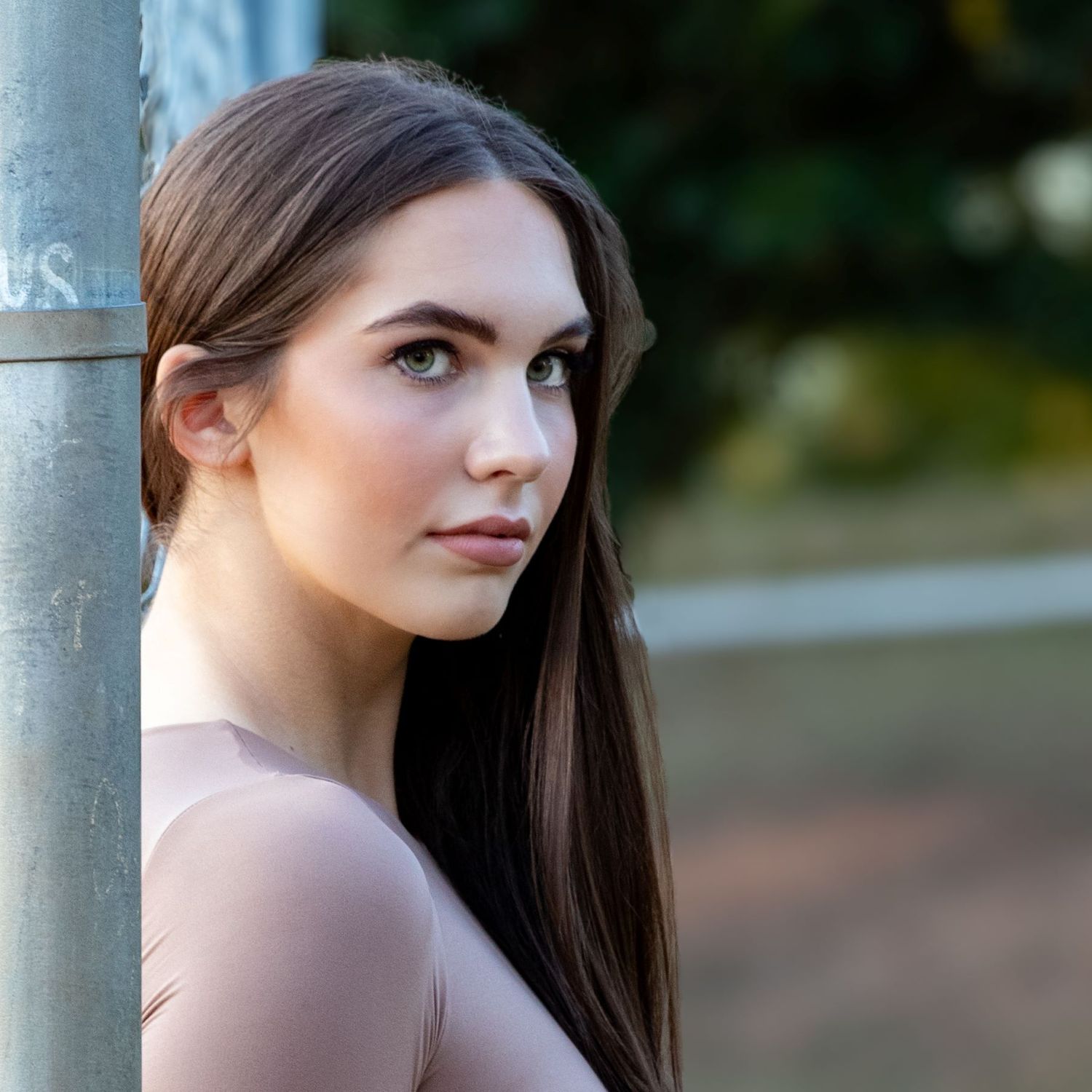 Atlanta park outdoor portrait with soft natural lighting and serene expression.