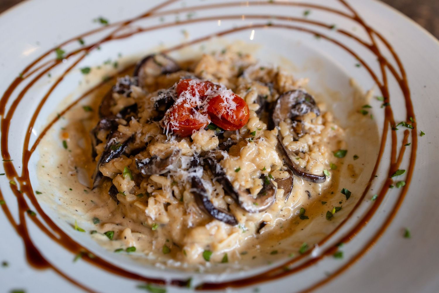 Maui food photography of mushroom risotto with tomato