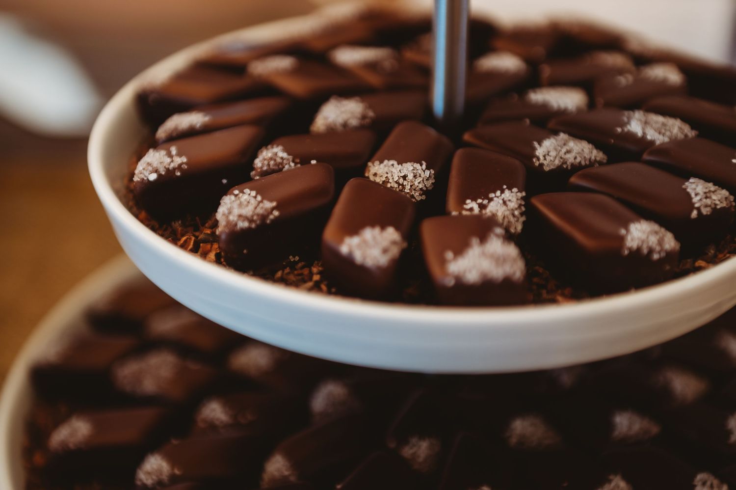 Elegant plated desserts displayed on a serving tray.