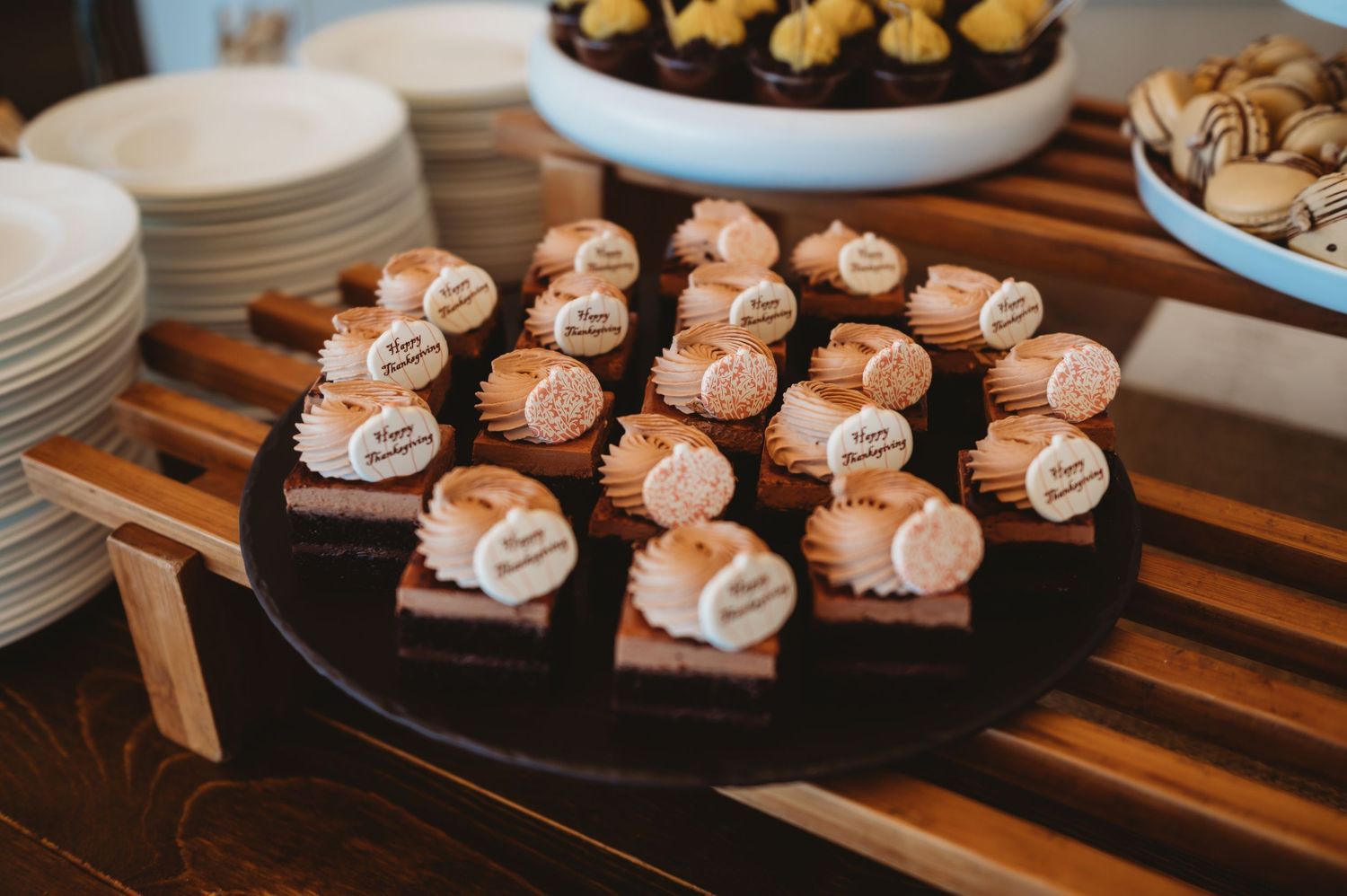 Elegant plated desserts displayed on a serving tray.