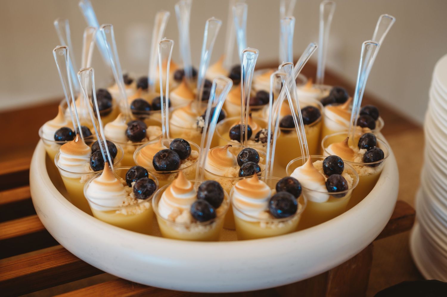 Elegant plated desserts displayed on a serving tray.