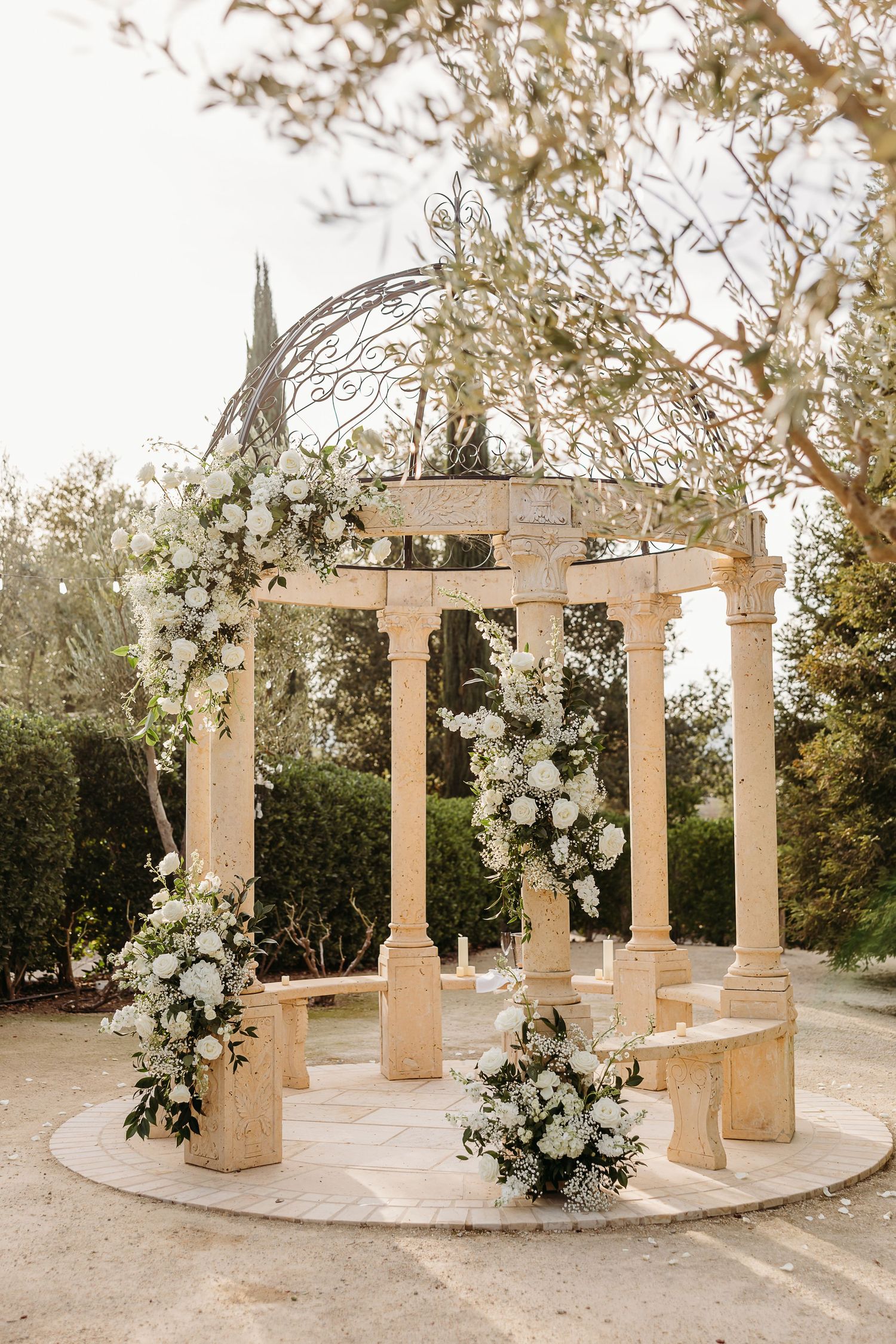 Gazebo decorated with white flowers for a proposal at Allegretto