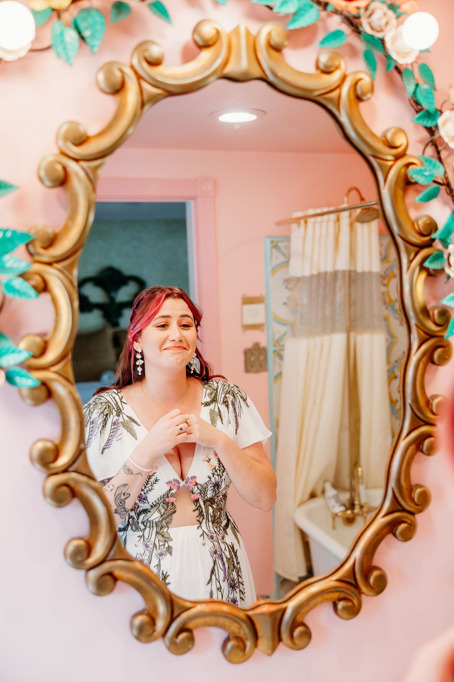 Vintage-style gold ornate mirror frames create a dreamy sequence in a pink-toned room.
